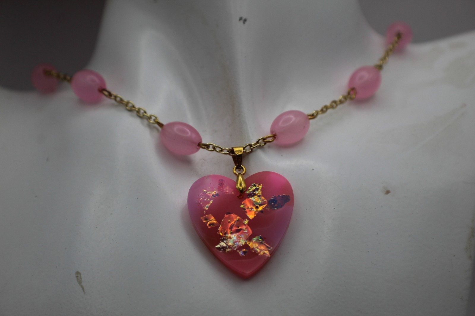 50 Shades Of Pink Heart Shaped Resin Pendant On A Beaded Chain