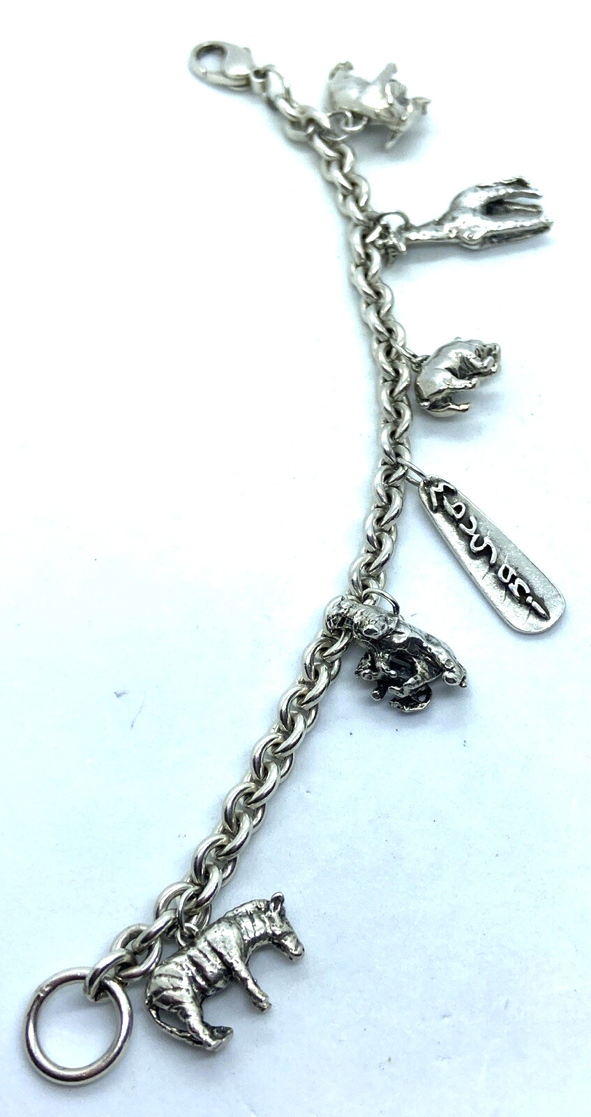 RARE SUSAN CUMMINGS STERLING SILVER (5) AFRICAN ANIMALS MBUGANI CHARM BRACELET