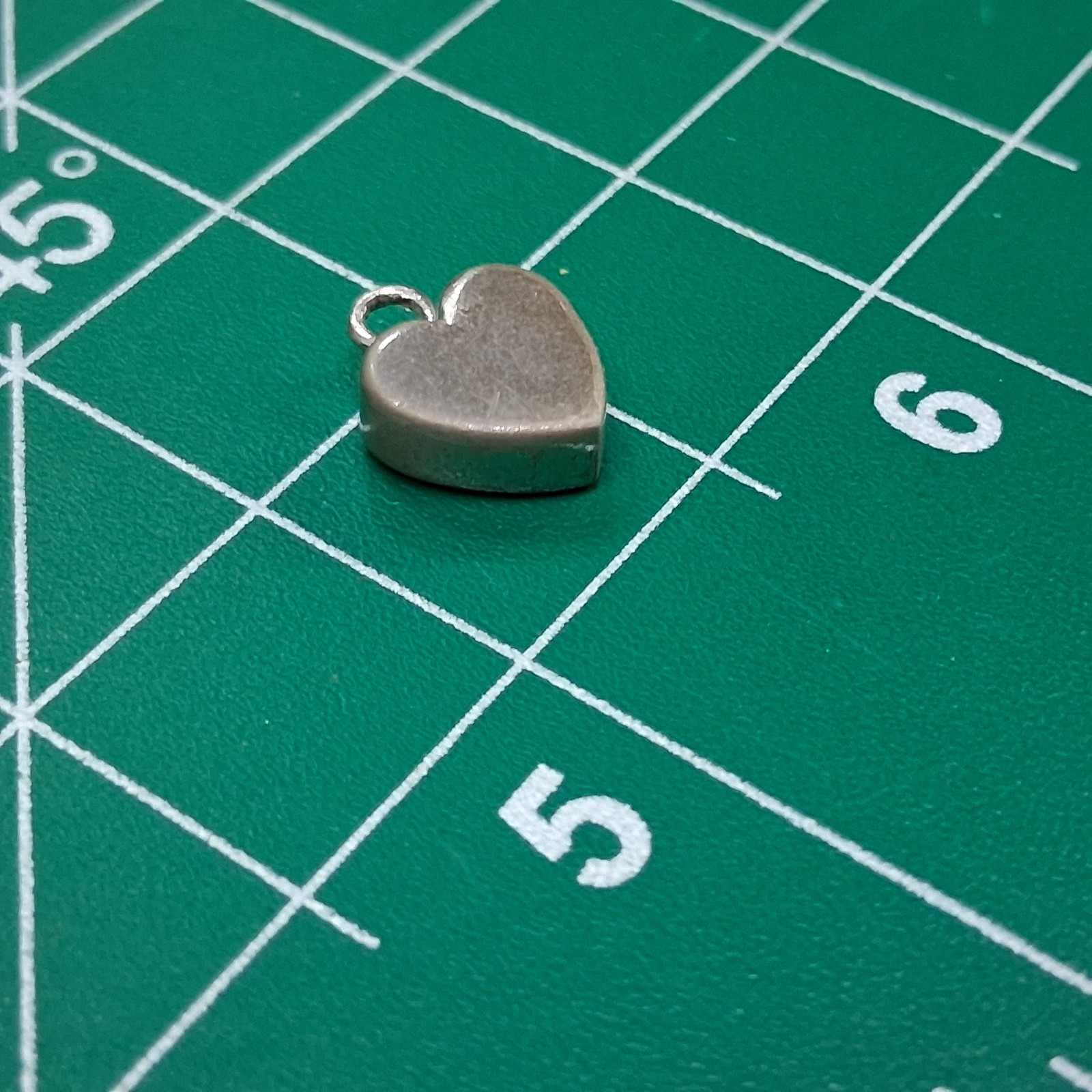 Vintage NF Marked .925 Sterling Silver Flattened Heart Shaped Charm