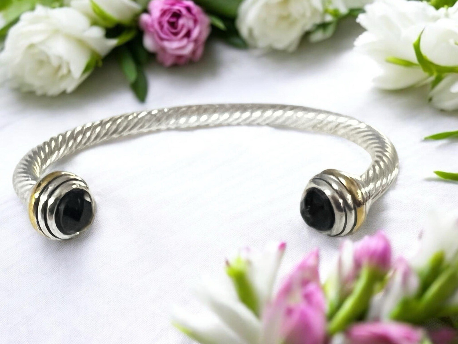 Silver Tone Twisted Open Cuff Bracelet with Black Faceted Stone Ends