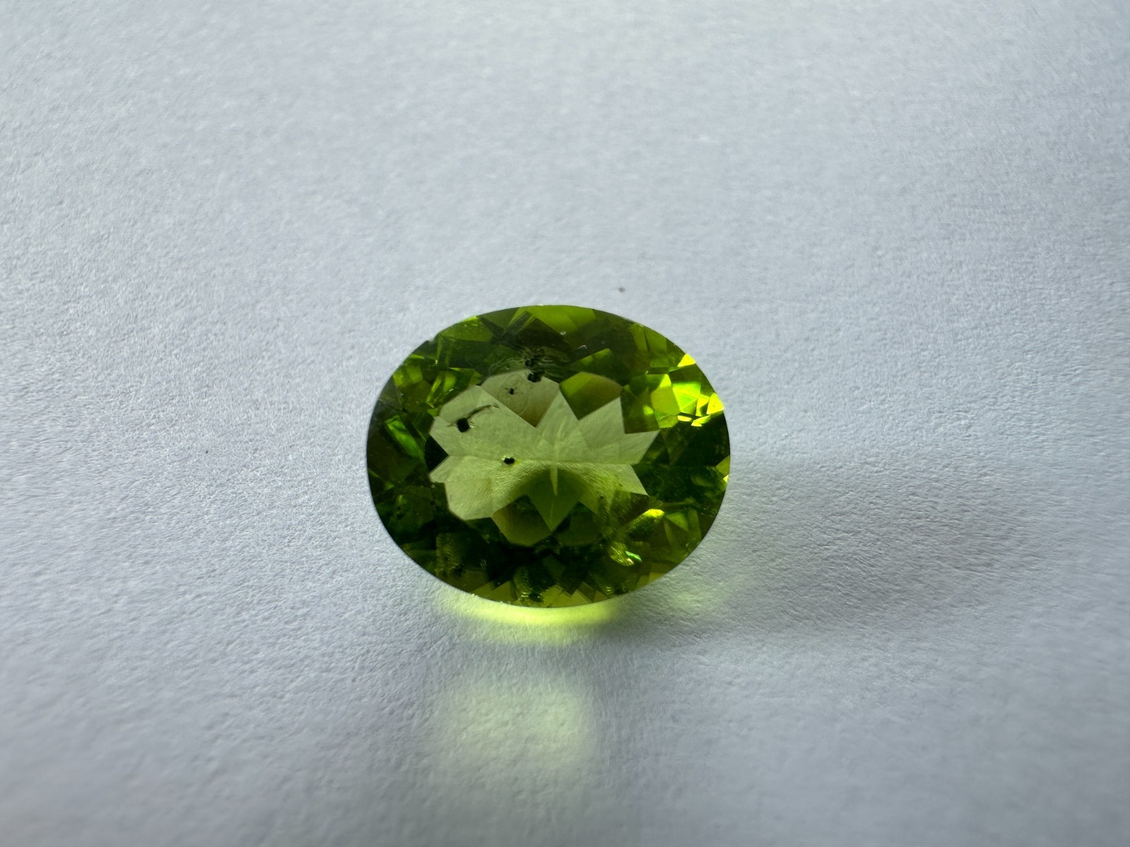 5.33ct Natural Peridot | 11.98 x 9.95mm Oval Cut | China Origin | Heat Treated