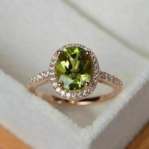 2.90 Ct Oval Cut Lab-Created Peridot Halo Engagement Ring 14K Rose Gold Plated