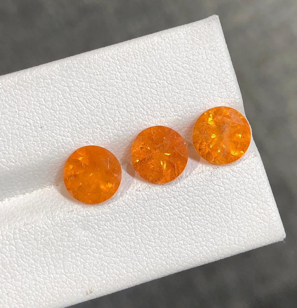 7.69 carat Natural Spessartite Garnet for earrings with Round shape from Africa
