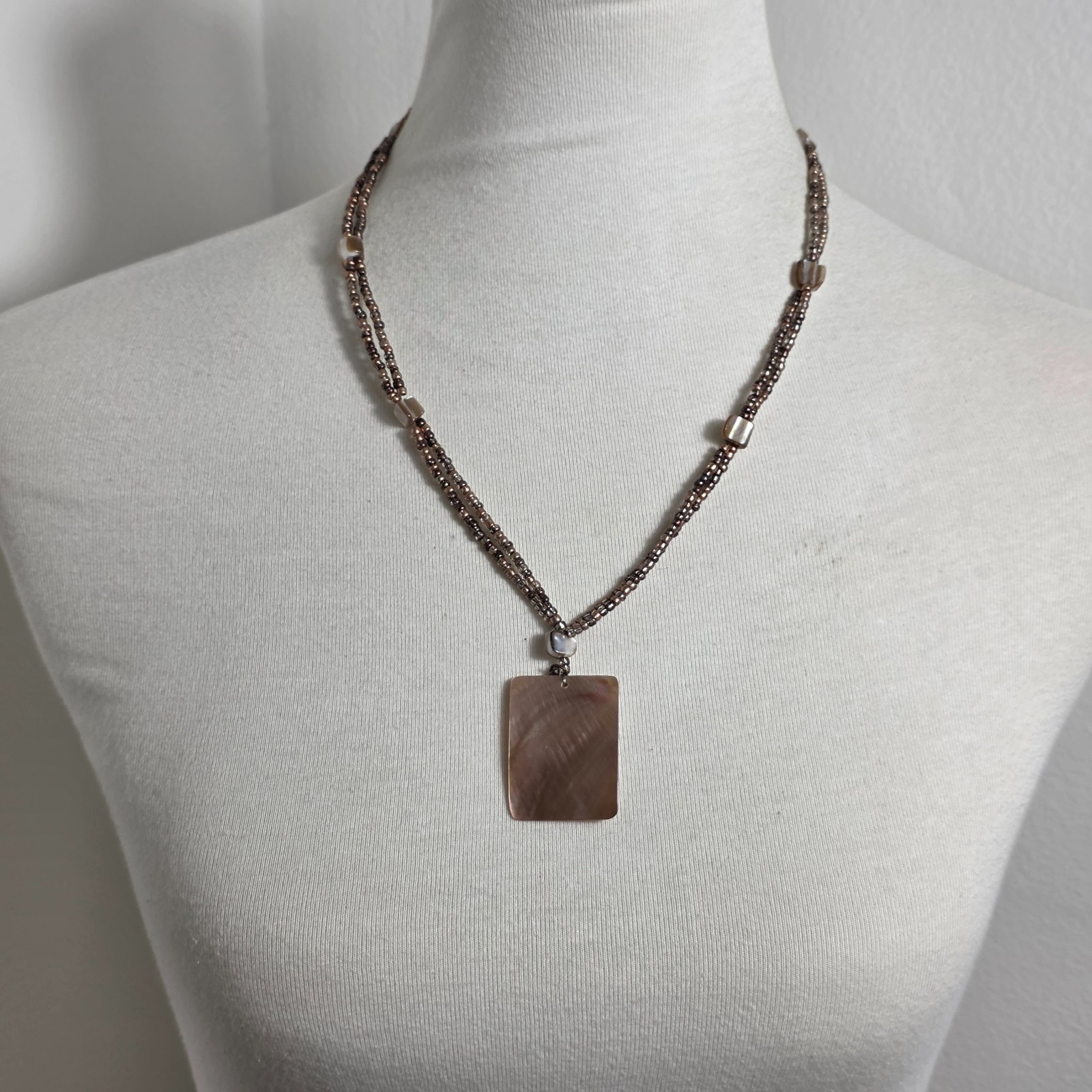 Distinctive Rectangle Shell Pendant Necklace Multiple Strands Brown Seed Beads