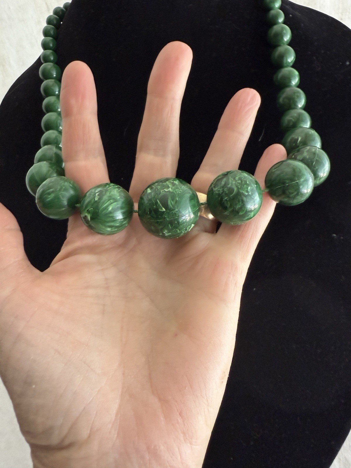 Graduated green plastic resin bead necklace