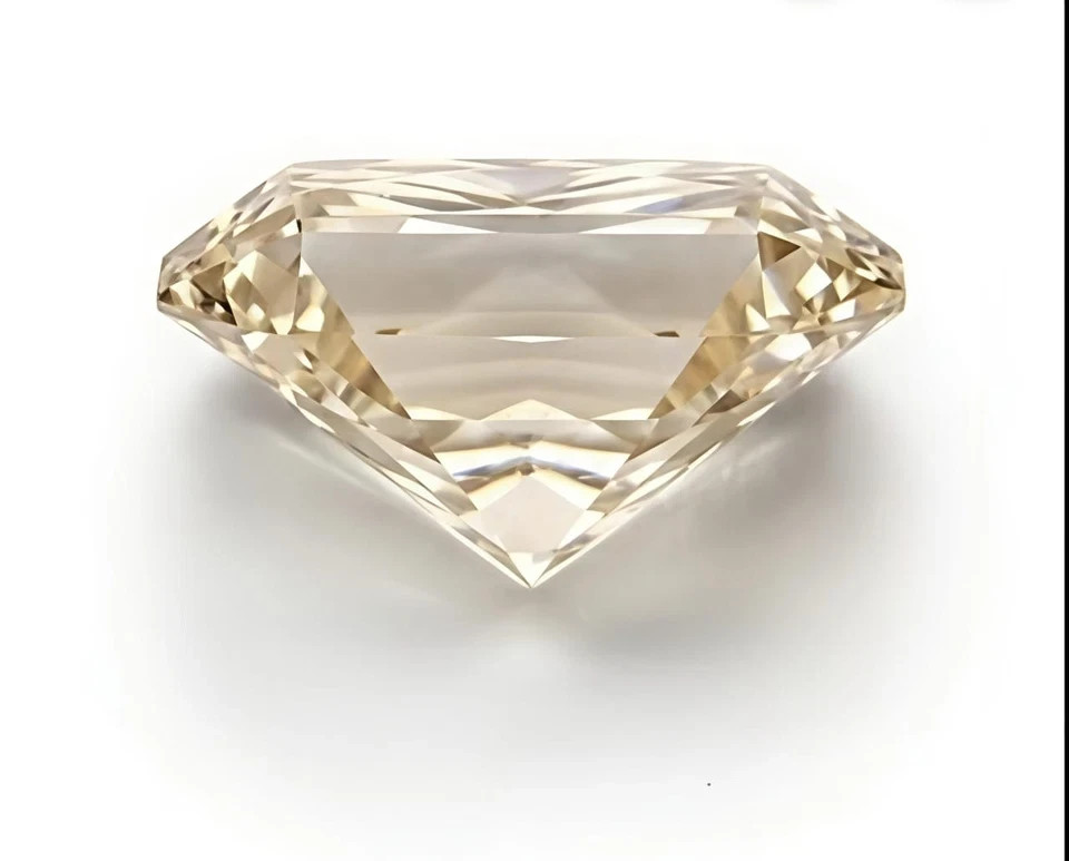 2 CT Fancy Light Champagne color, Radiant Cut, VVS1 Lab Grown Diamond 7×9 mm Gem