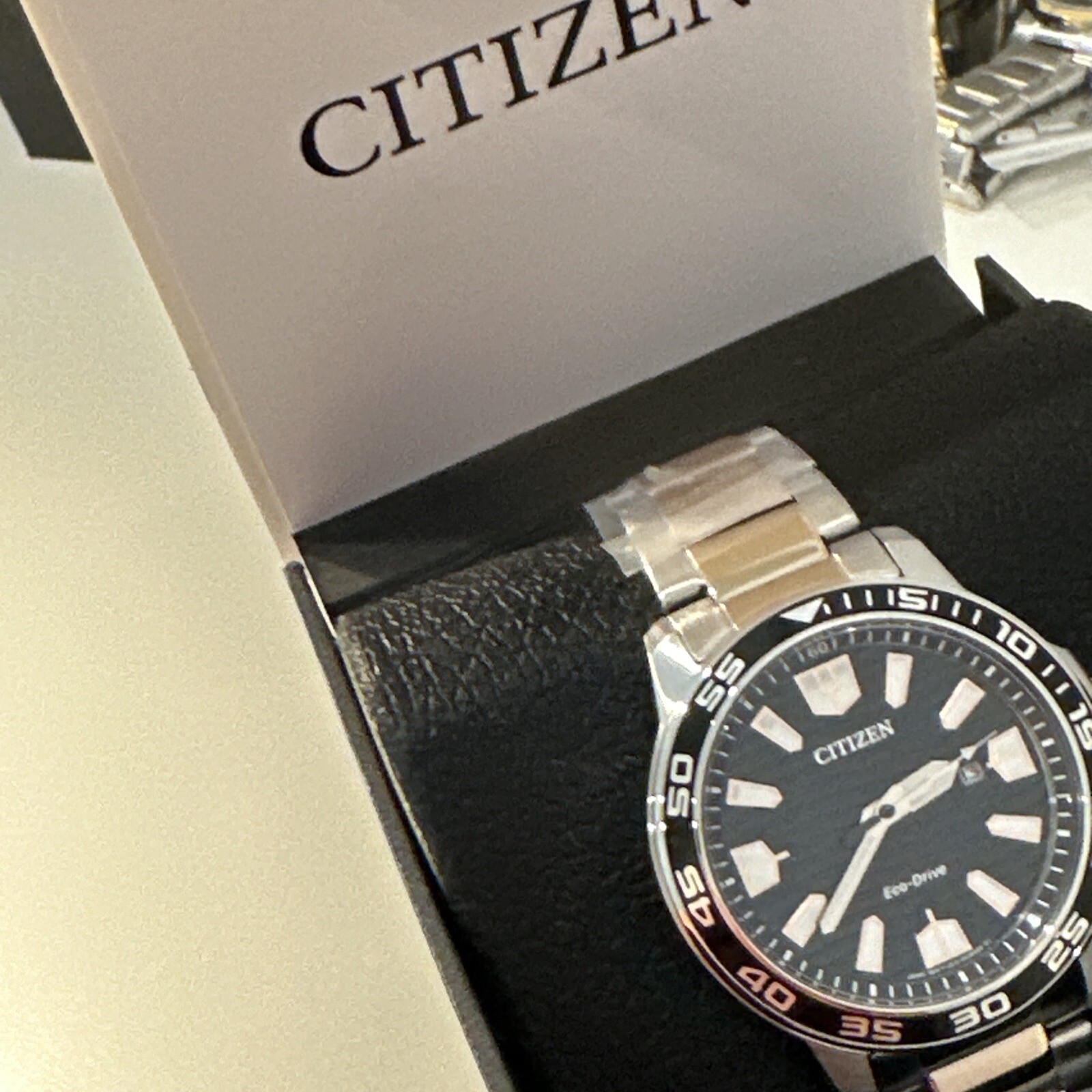 Citizen Eco-Drive Dual Tone AW1706-52E Black Dial Date Display Men’s Watch