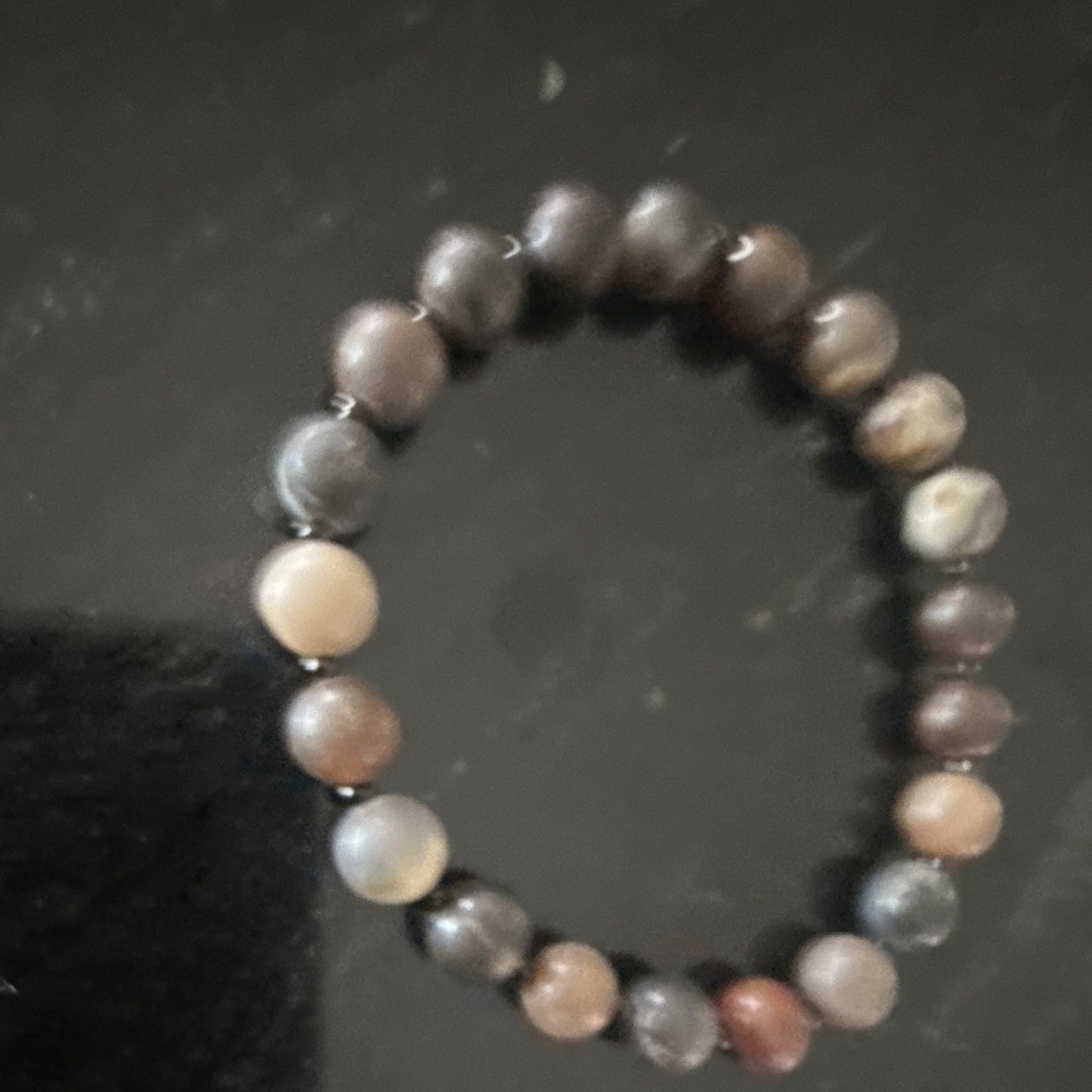 Petrified wood 6 mm and hematite spacers 6 1/2 inch but we can make it to any si