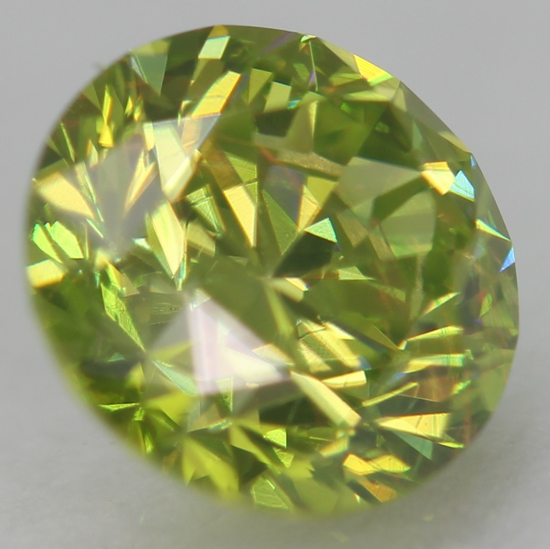 Cert 0.57 Carat Vivid Green VVS1 Round Brilliant Natural Enhanced Diamond 5.23mm