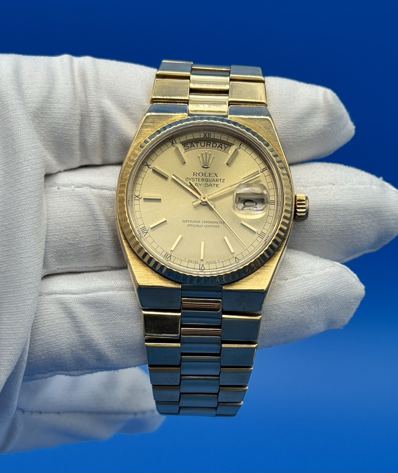 Rolex 19018 President Day Date Oysterquartz 18K Gold 36mm Champagne Dial Watch