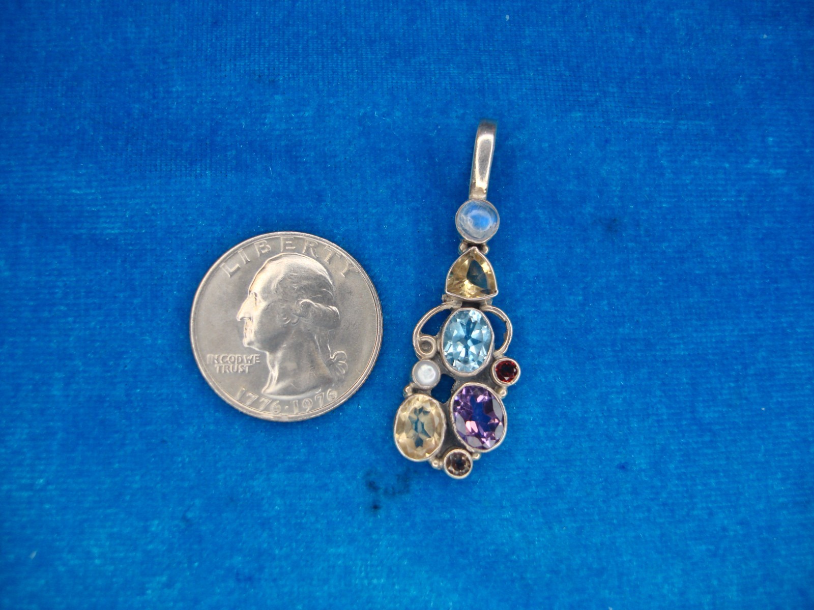PRETTY STERLING SILVER PENDANT WITH 7 DIFF. COL. STONES & PEARL