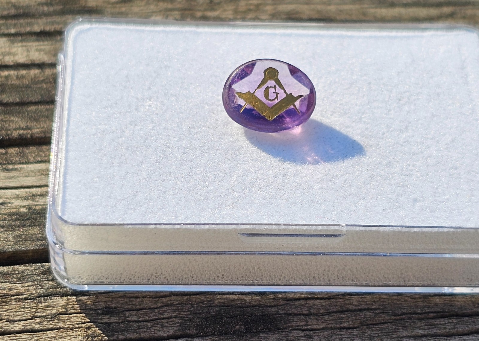 Amethyst 11.4×9.5mm Oval Loose Stone with Mason symbol
