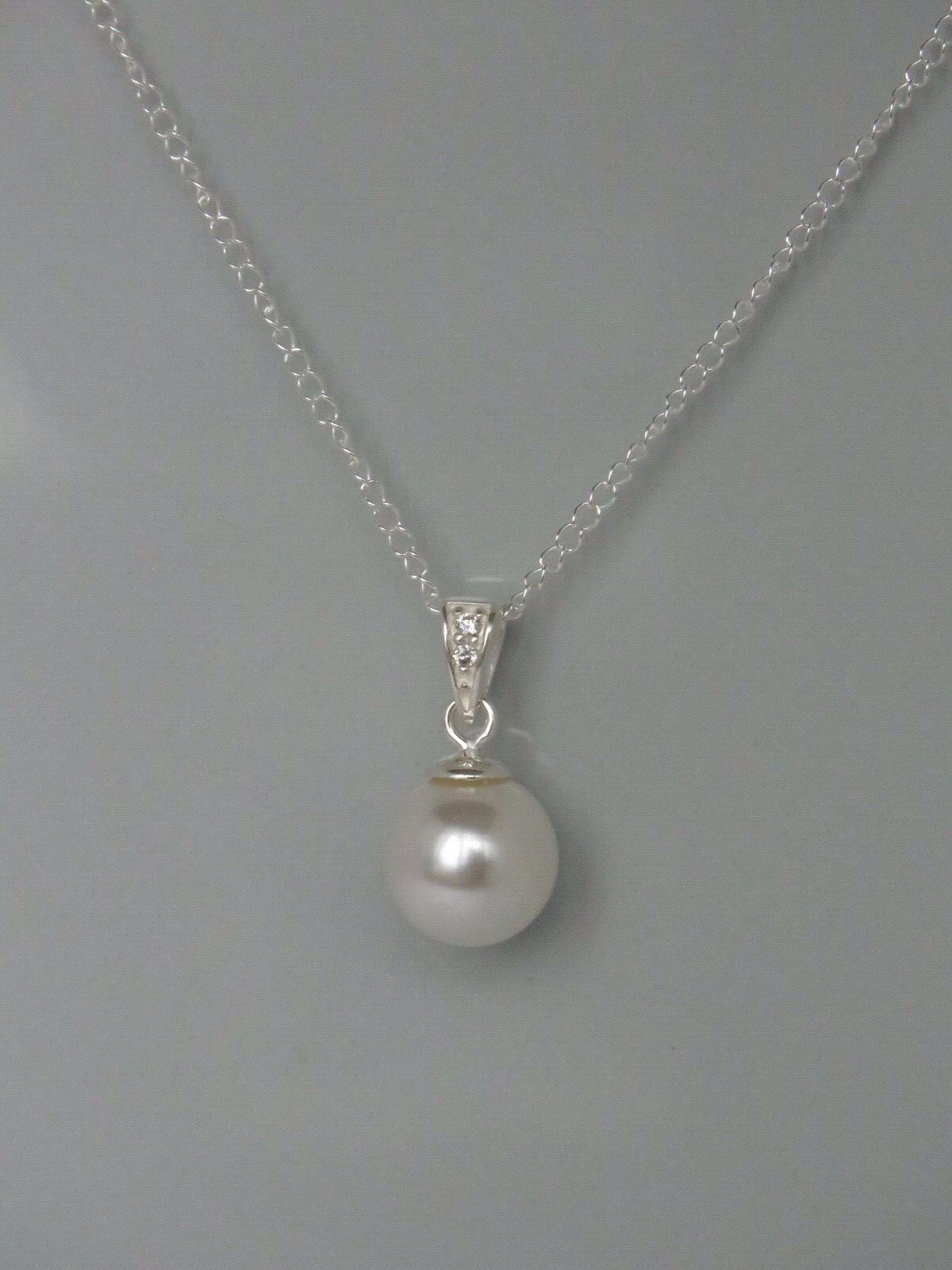 925 Sterling Silver Necklace Made With a Swarovski White Pearl Pendant (sa10.)