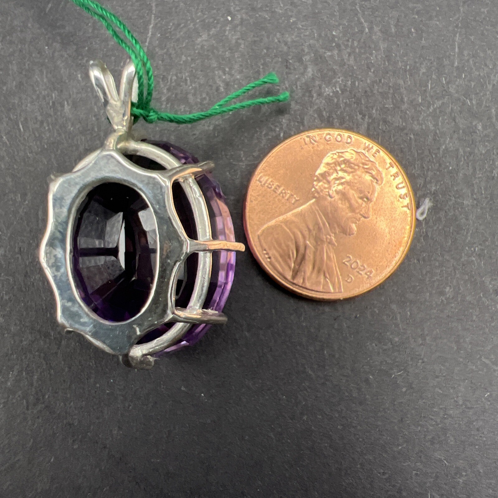 31.69 ct Amethyst and Sterling Silver Pendant. 8.8 Grams