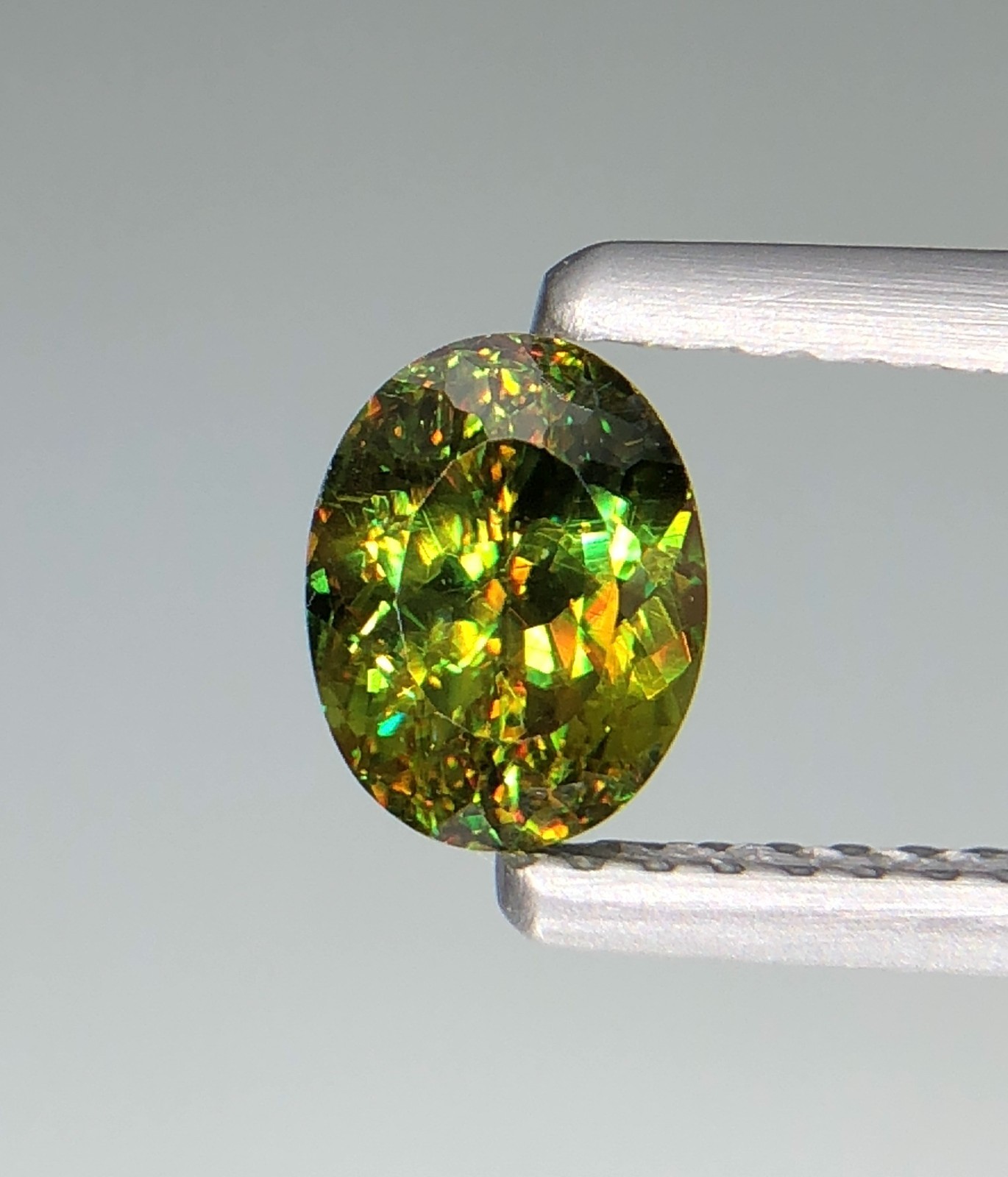 0.91 Ct Natural Faceted Full Fire Sphene / Titanite Oval Cut Loose Gemstone