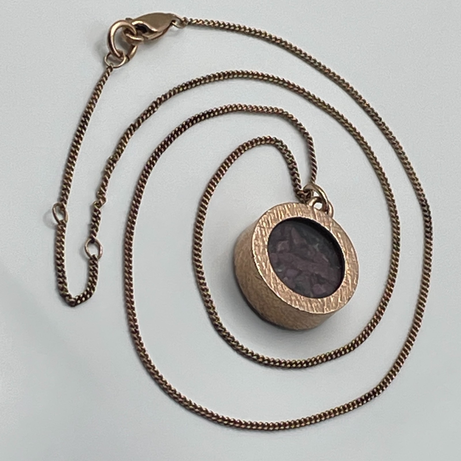 Rose gold on sterling silver/ruby amulet pendant and ‘925’ chain necklace 10.26g