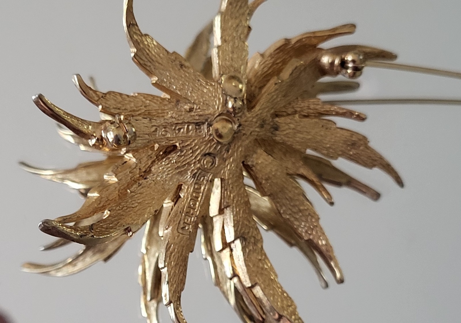 BOUCHER MCM GOLDTONE BROOCHE SIGNED AND NUMBERED