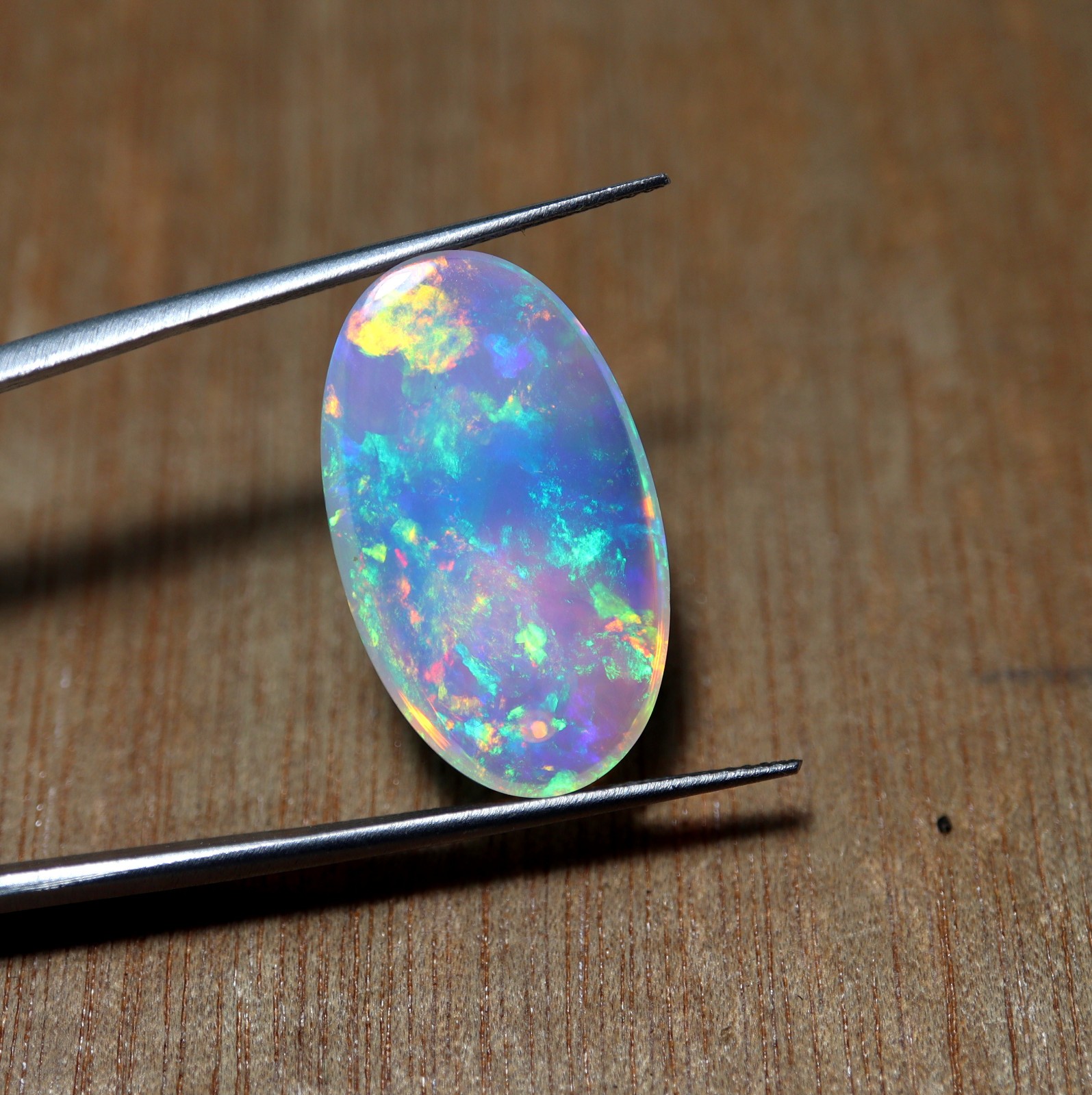 9.2 Ct 24.7×14.5 MM Natural Top Grade Rainbow Fire Ethiopian Opal Oval Cabochon