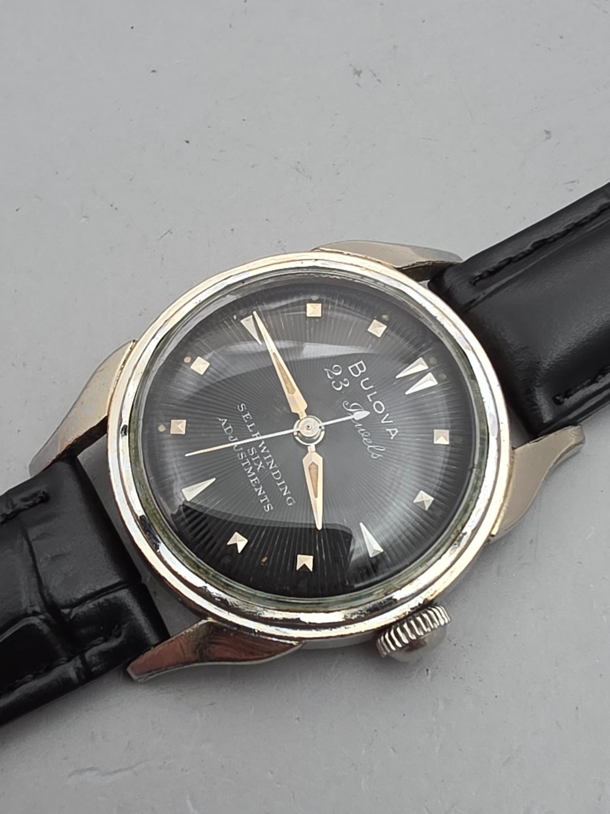 Vintage Bulova 23 “A” Men’s automatic watch 10K RGP Black Sunburst dial 1955