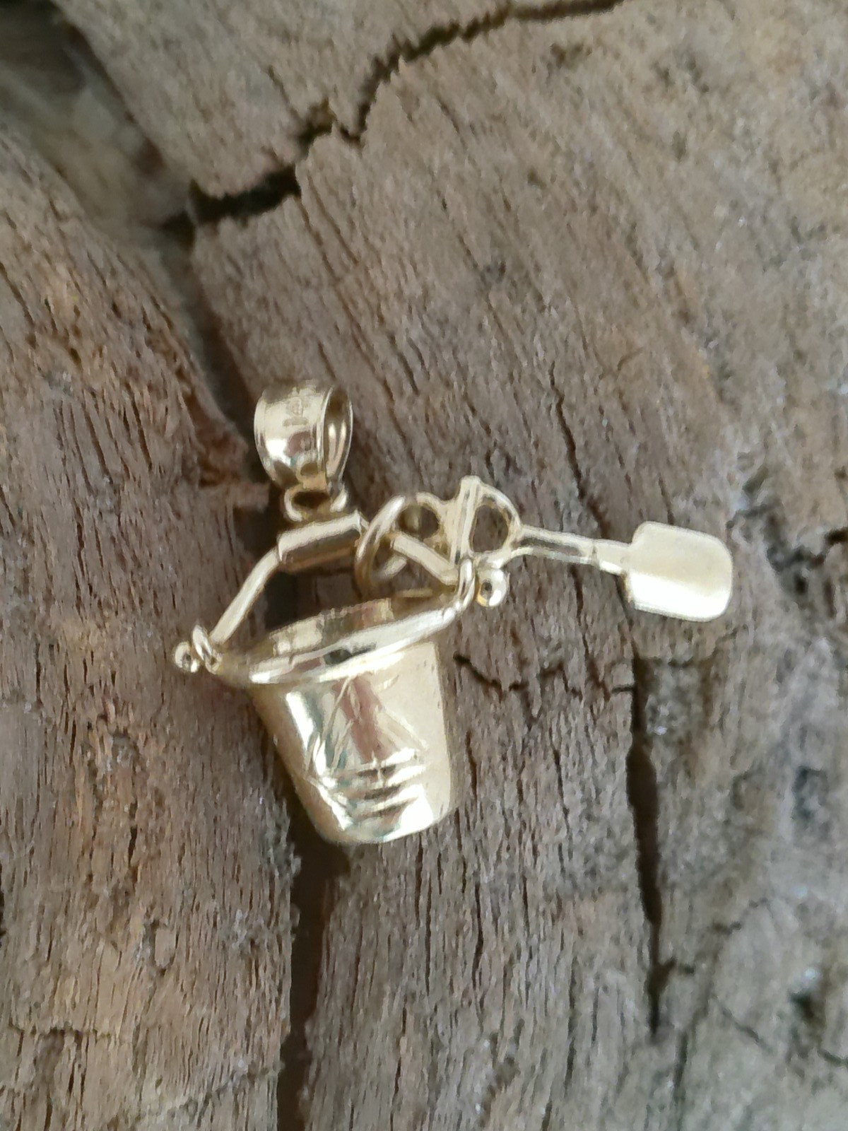marked 14K GOLD CHARM CAPE COD PAIL & SHOVEL SAILBOAT ON BACK SIDE 2.4 GRAMS