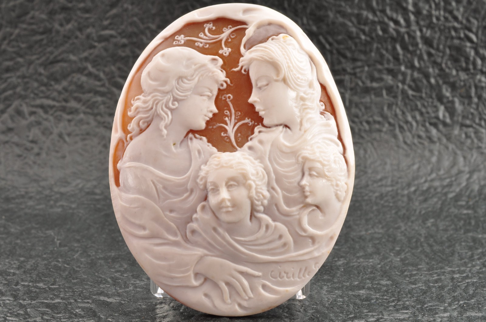 Vintage oval shape shell cameo “Brothers and Sisters” (115.0ct), sign by artist.