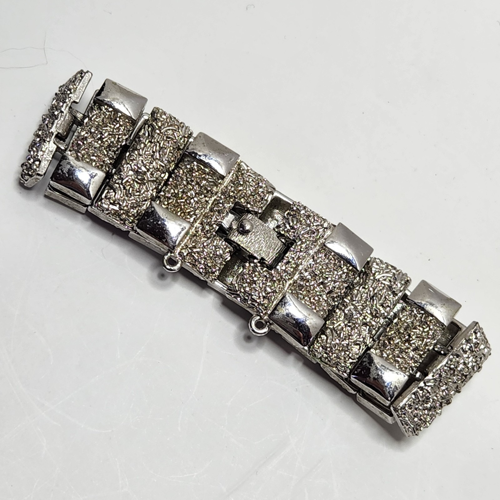 Vintage Monet Silvertone Bracelet Textured 1″ wide 7″ Fold Over Clasp No Safety