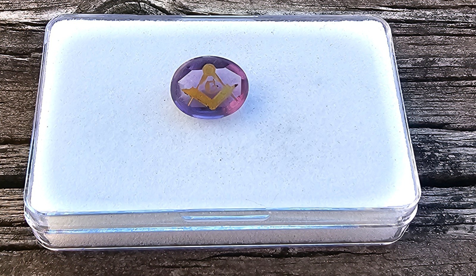 Amethyst 11.4×9.5mm Oval Loose Stone with Mason symbol