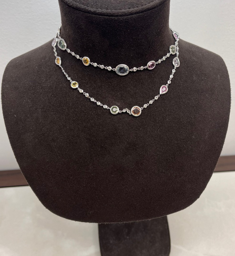 An Elegant White Gold Blue Sapphire and Diamond By-the-Yard Necklace