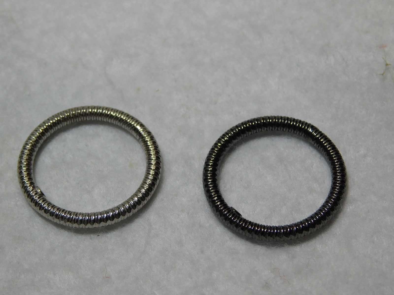 Pair of Sterling Silver, Made in Italy Plain Band Rings. Size 9.5 in Good Cond.