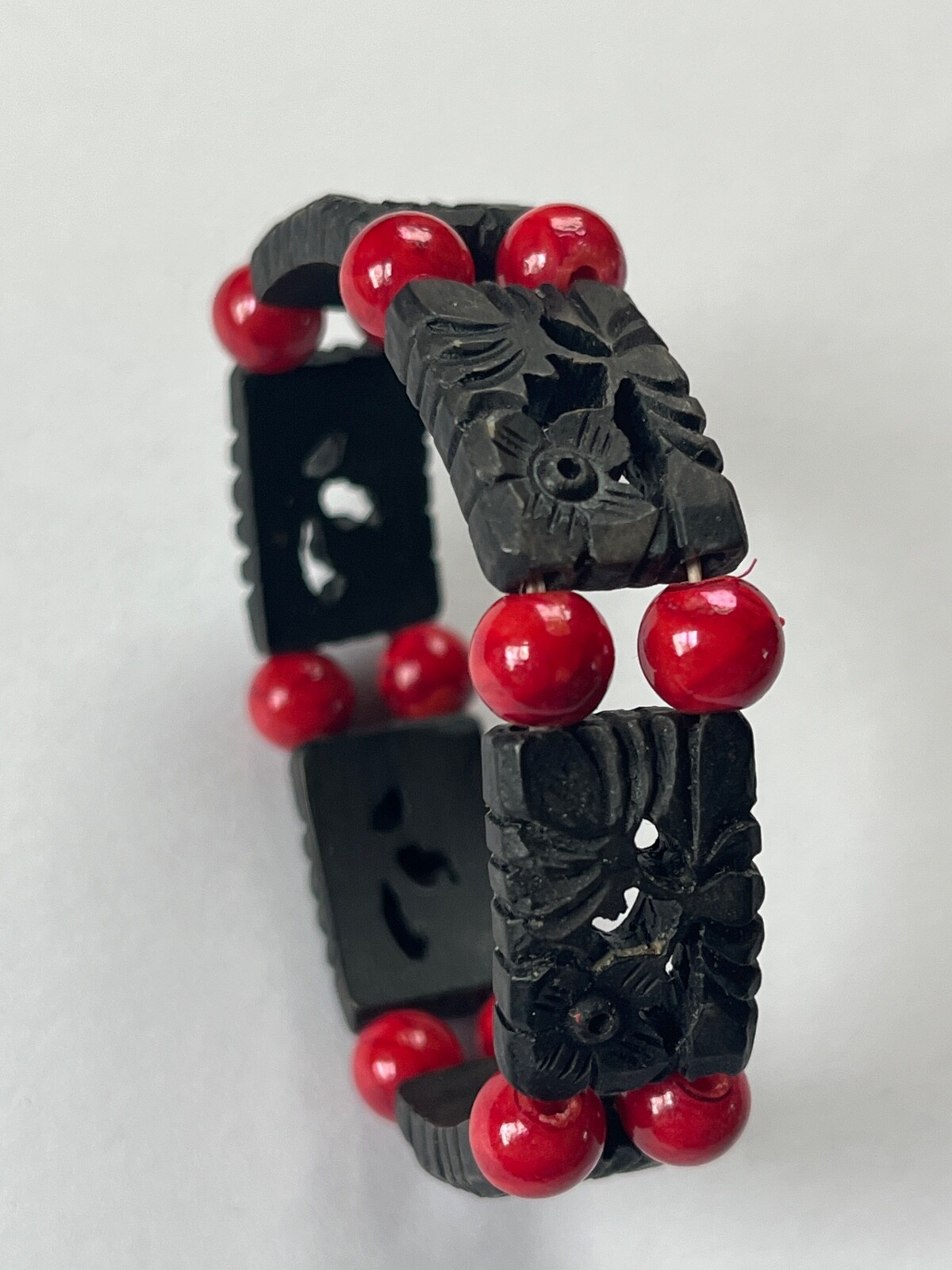 Alternating Carved Black Floral Rectangle & Red Round Plastic Beads Stretch Brac