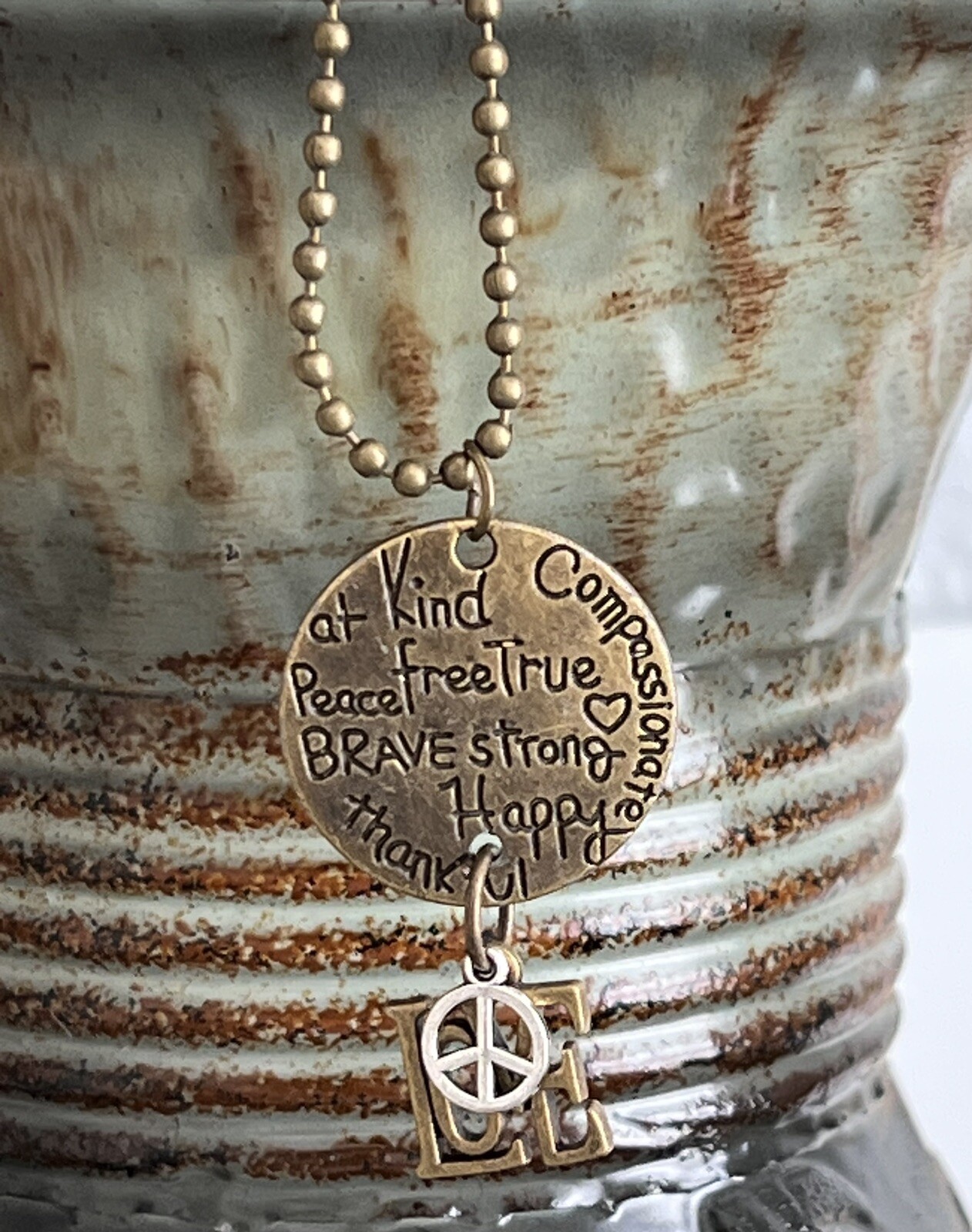 Beautiful BE KIND Etched Bronze Necklace. Love.