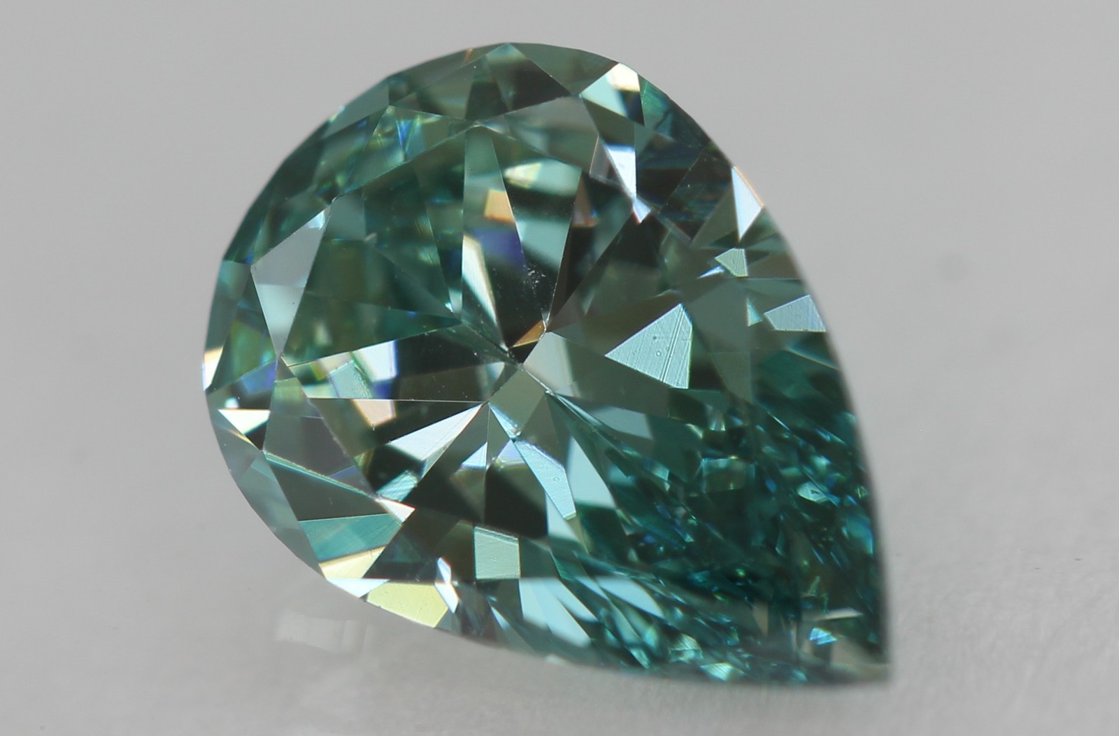 Cert 0.80 Carat Fancy Vivid Blue VVS1 Pear Natural Enhanced Diamond 7.83×5.37mm