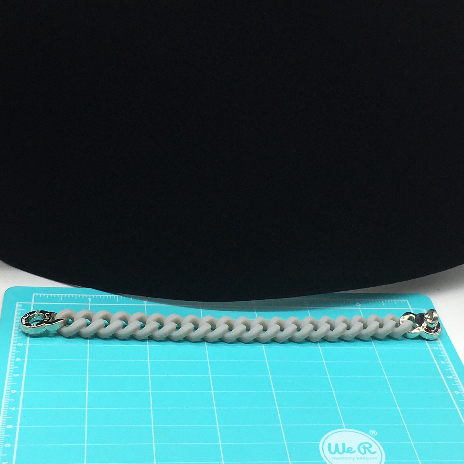 Rustic Cuff Gray Silver Tone Logo Turn Lock Silicone Stretch Chain Bracelet
