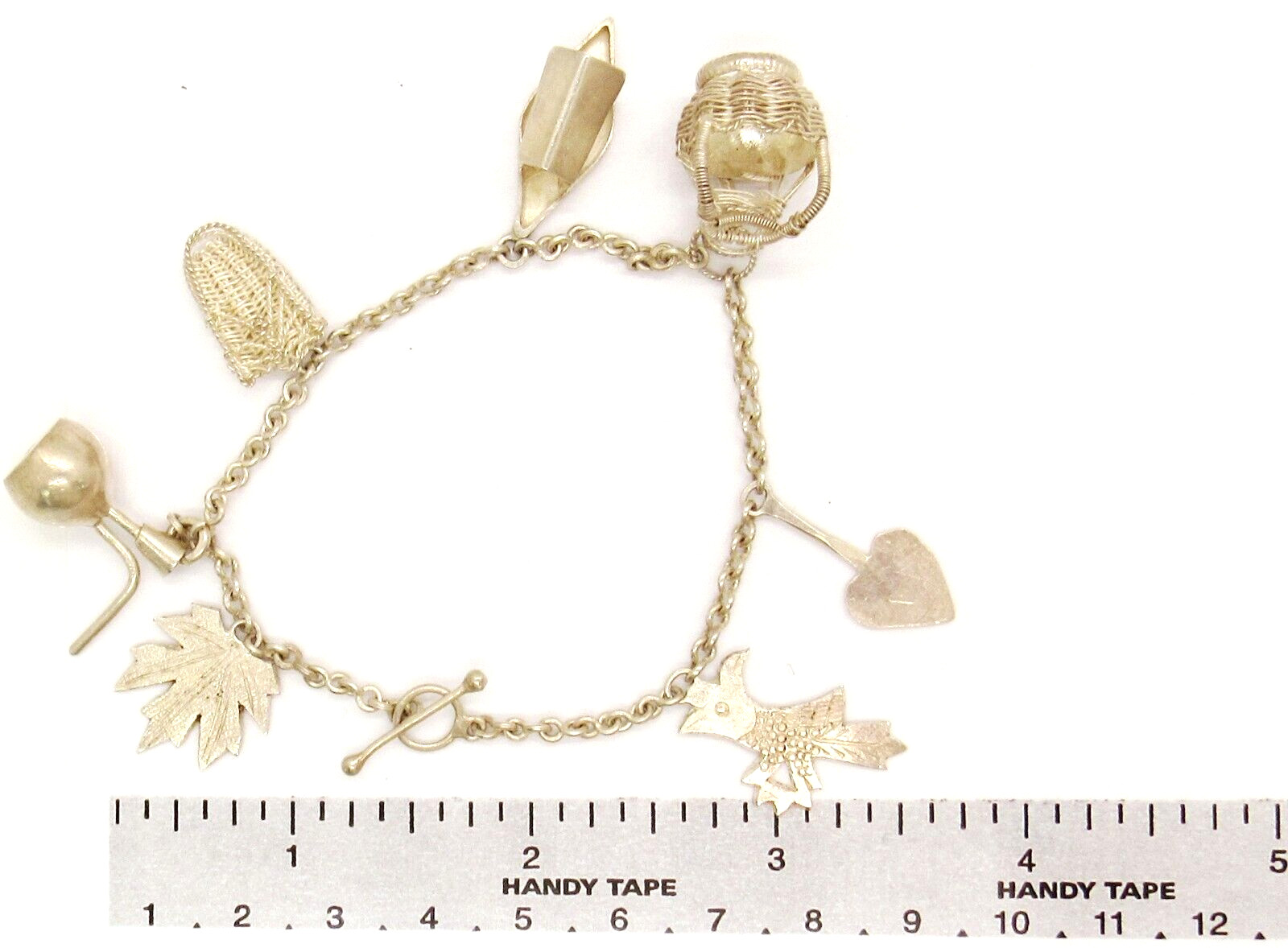 VINTAGE HANDMADE SILVER TIRBAL ORIENTAL SOUTHEAST ASIA CHARM ESTATE BRACELET