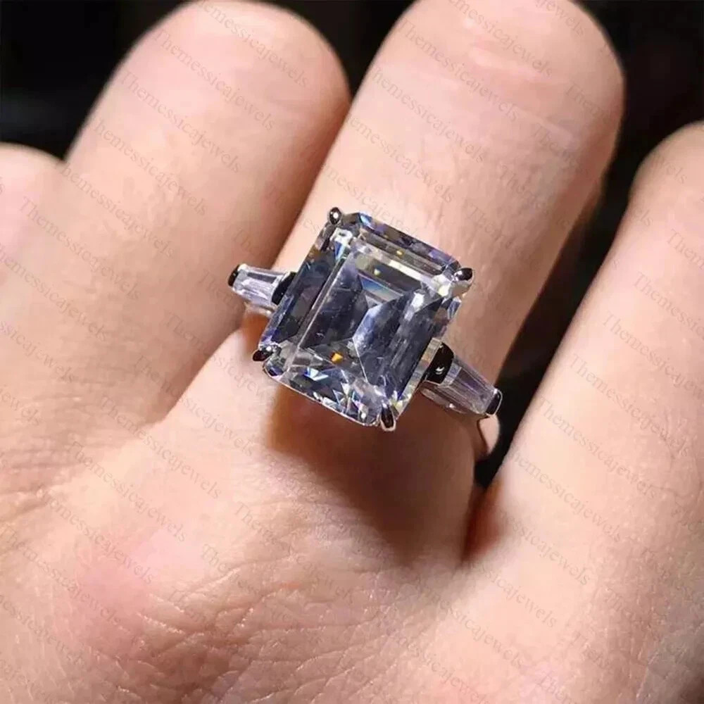 9.0TCW Emerald Cut Moissanite 3-Stone Engagement Ring In 14k White Gold Plated