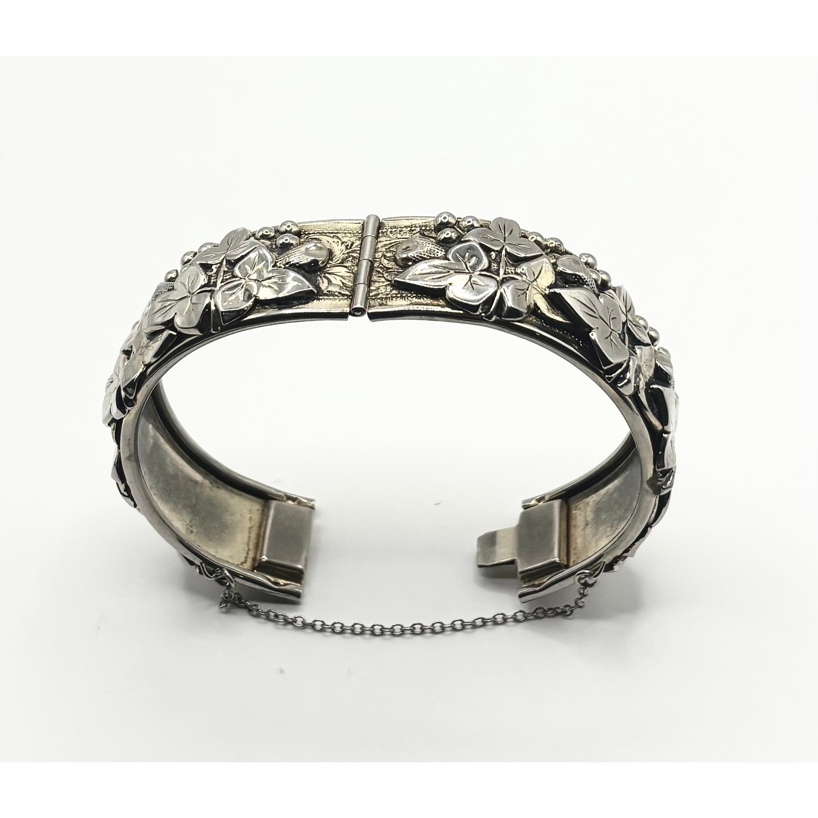 Vintage Silver Tone Embossed Floral Hinged Bangle Bracelet with Safety Chain