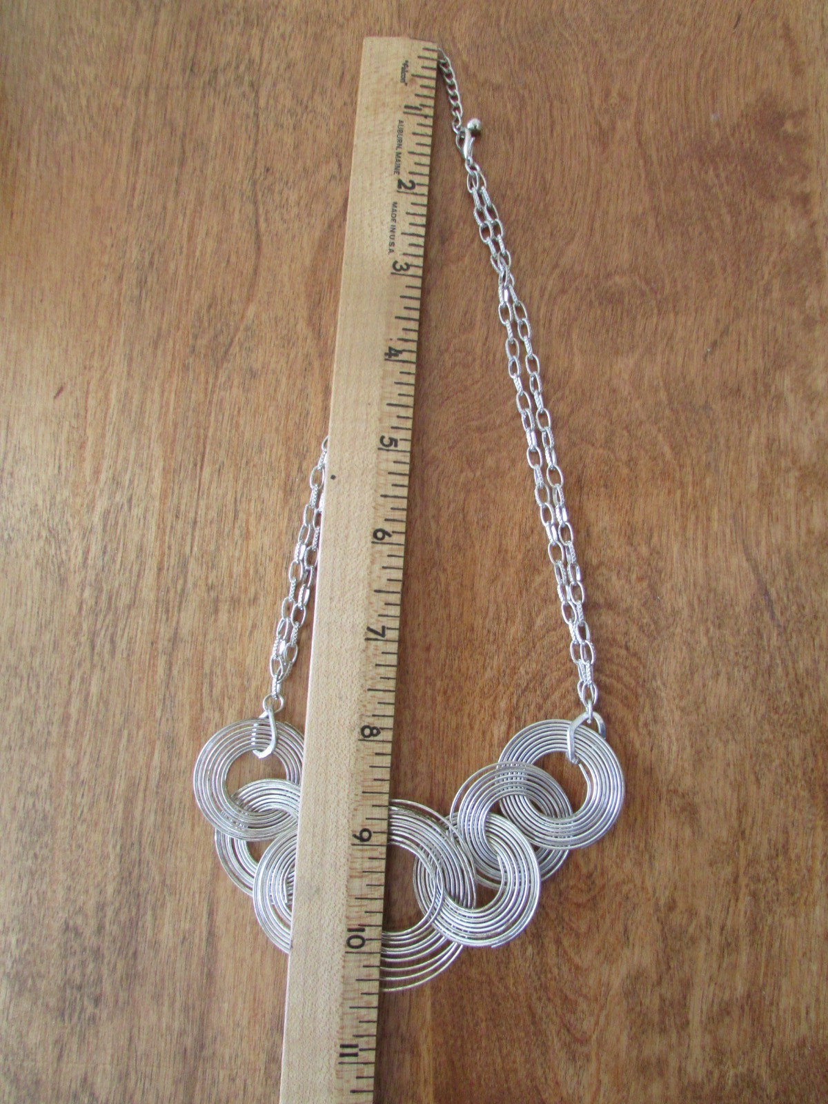 SILVER TONED WIRE LINK COIL AND CHAIN NECKLACE
