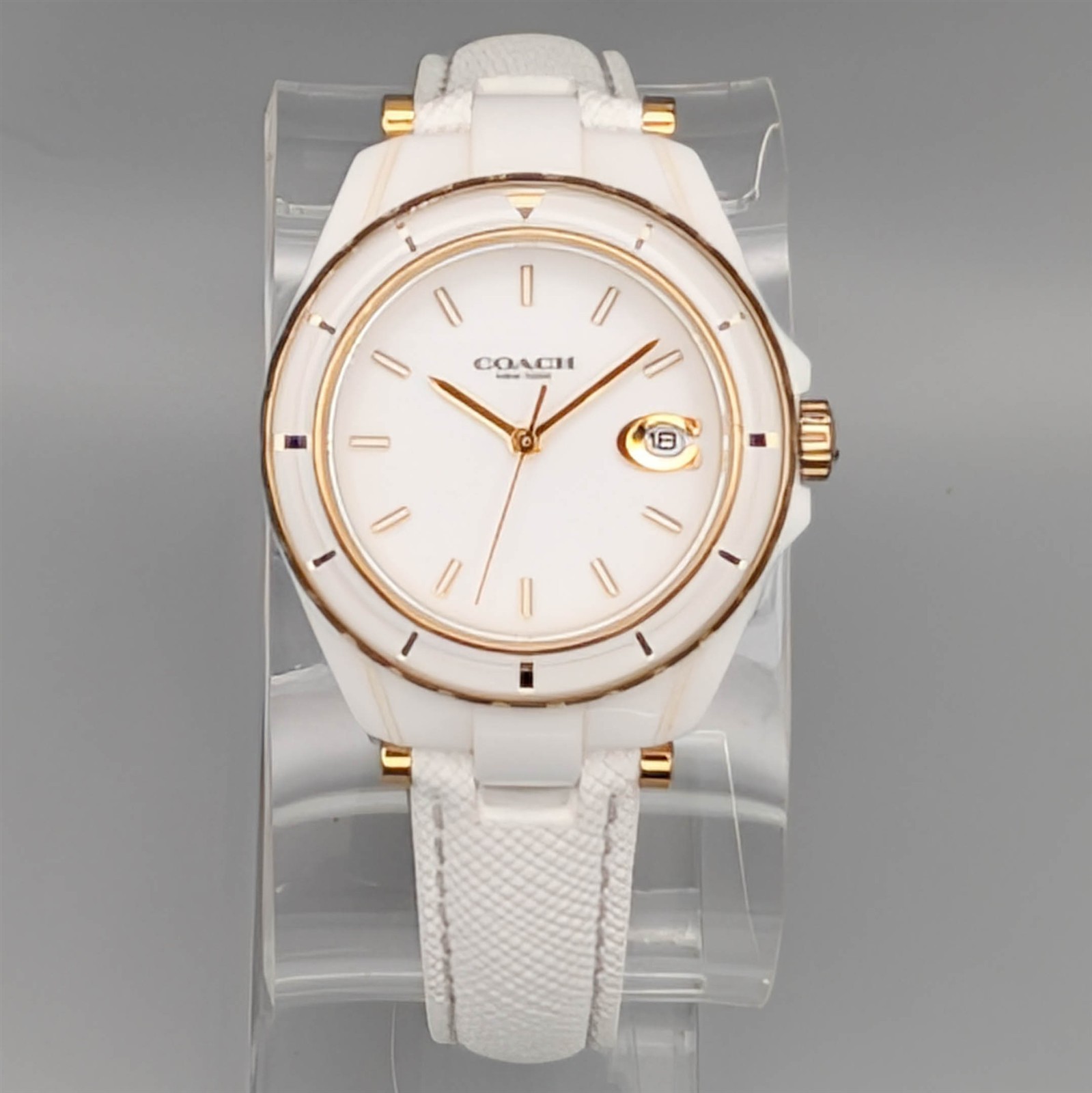 Coach women’s white & gold accent ceramic + leather watch CA.129.7.49.2049