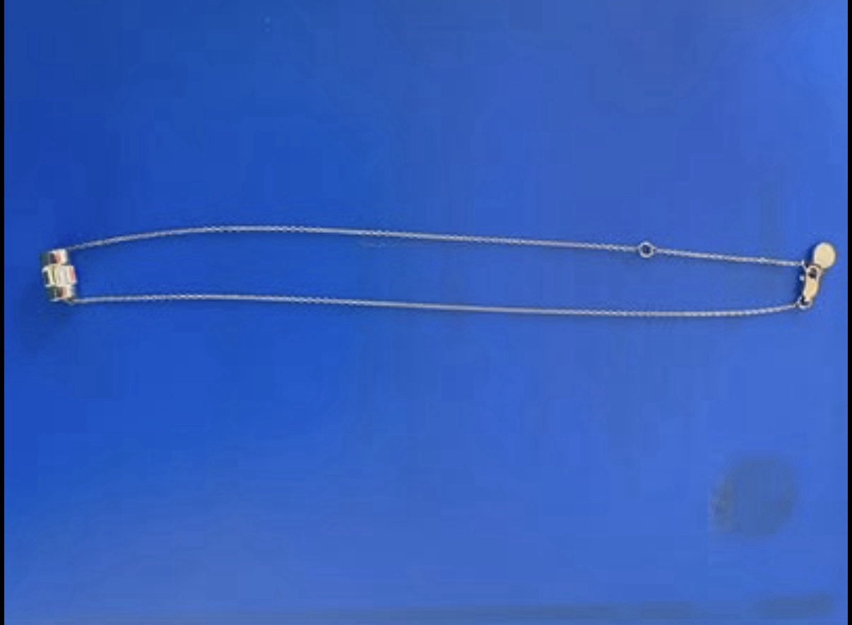 Michael Kors Silver Tone Crystal Baguette Barrel Pendant Necklace