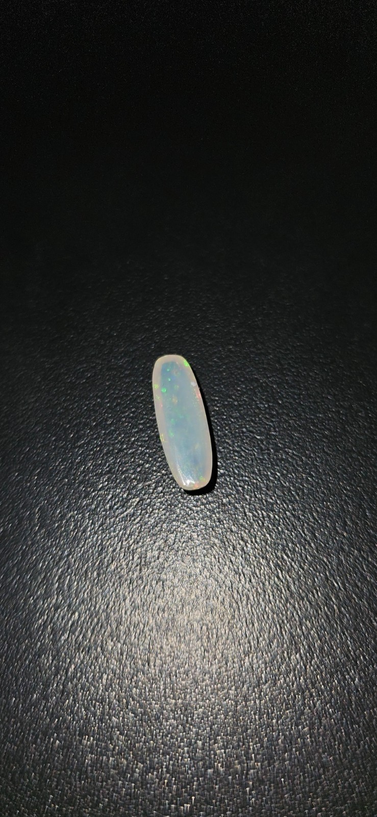 Long Cushion Cut Natural Crystal Opal. 1.18 Carats 12mm x 4mm x 3mm