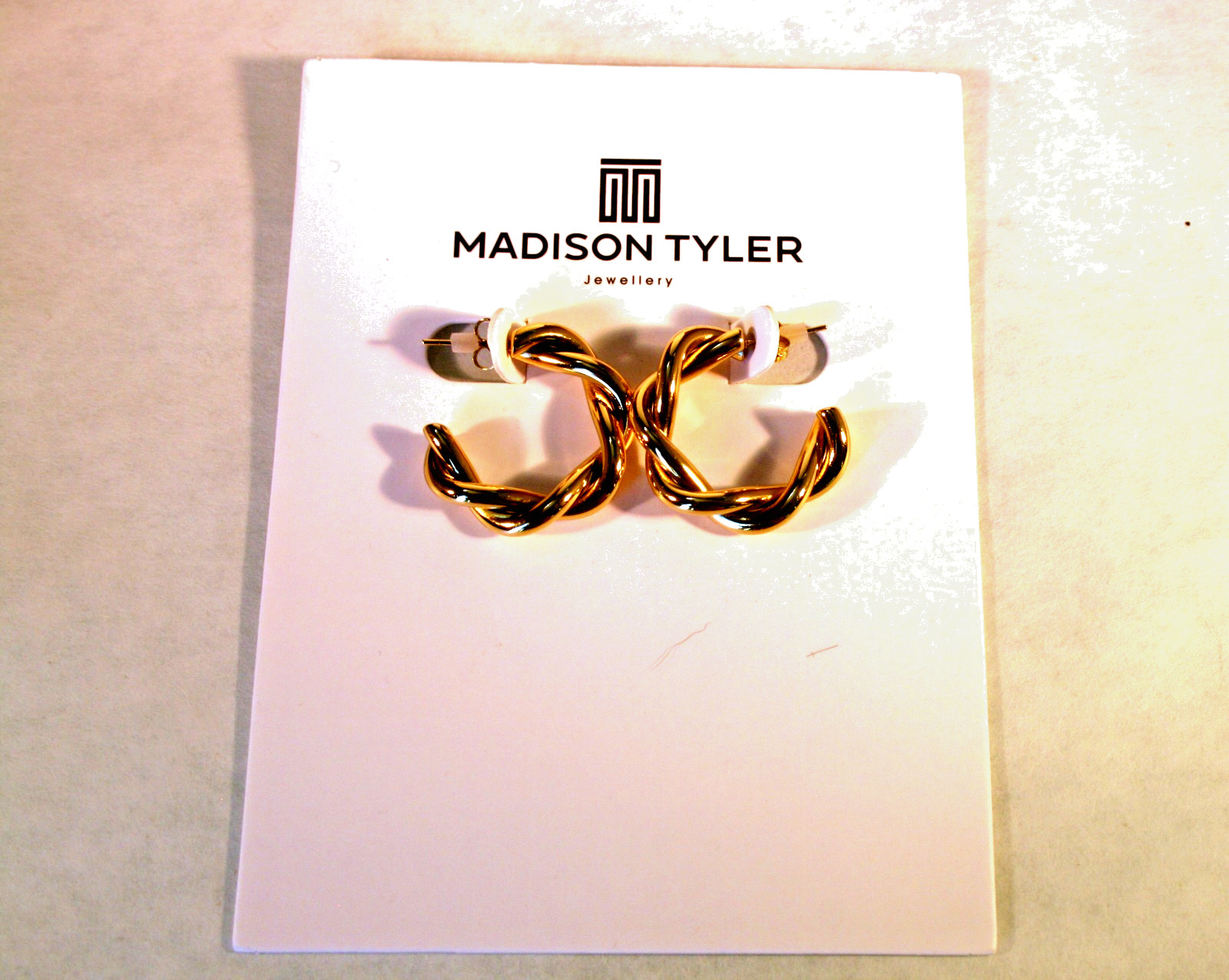 Madison Tyler gold tone shiny tubular twisted open hoop earrings 1 “