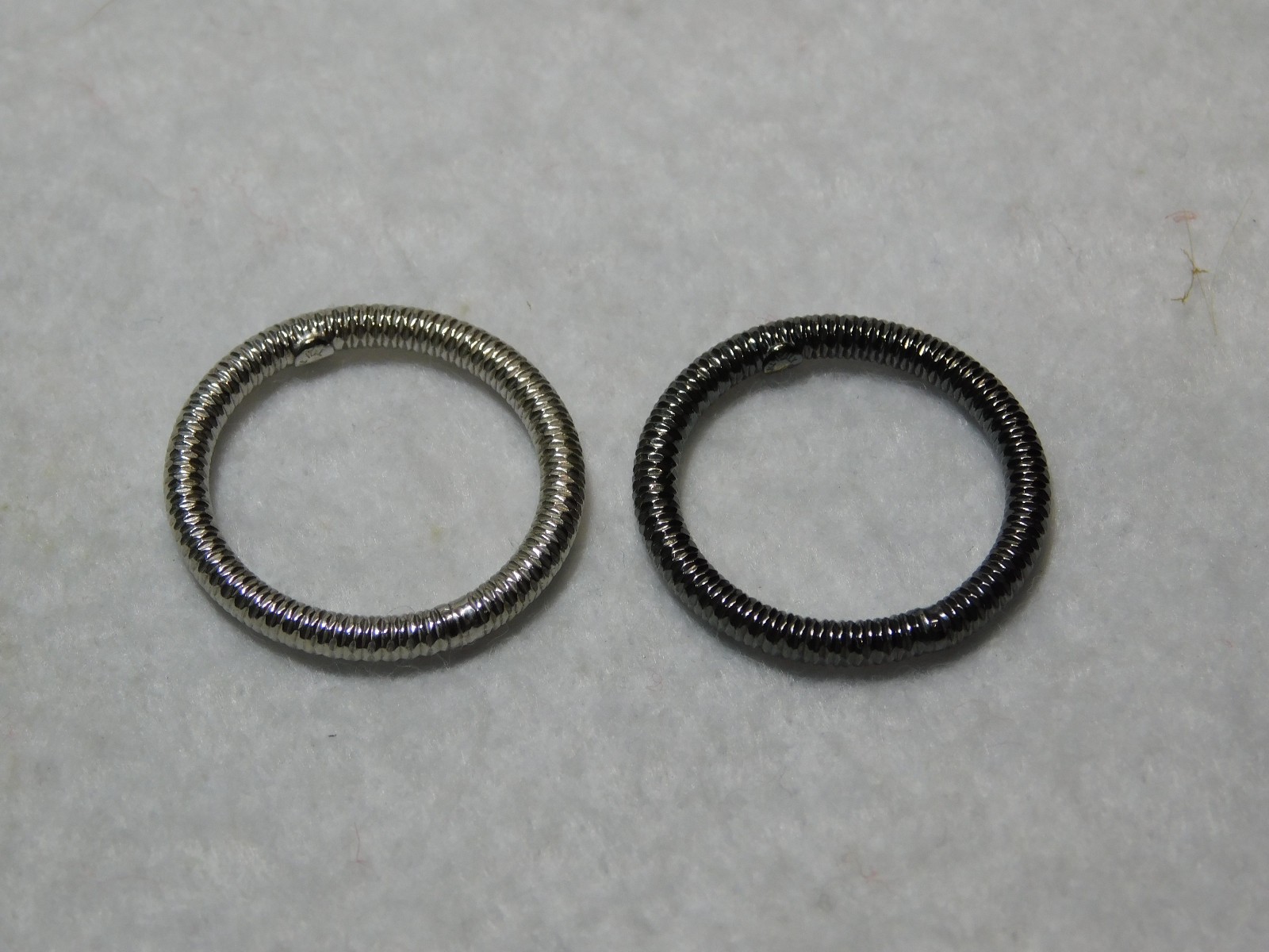Pair of Sterling Silver, Made in Italy Plain Band Rings. Size 9.5 in Good Cond.