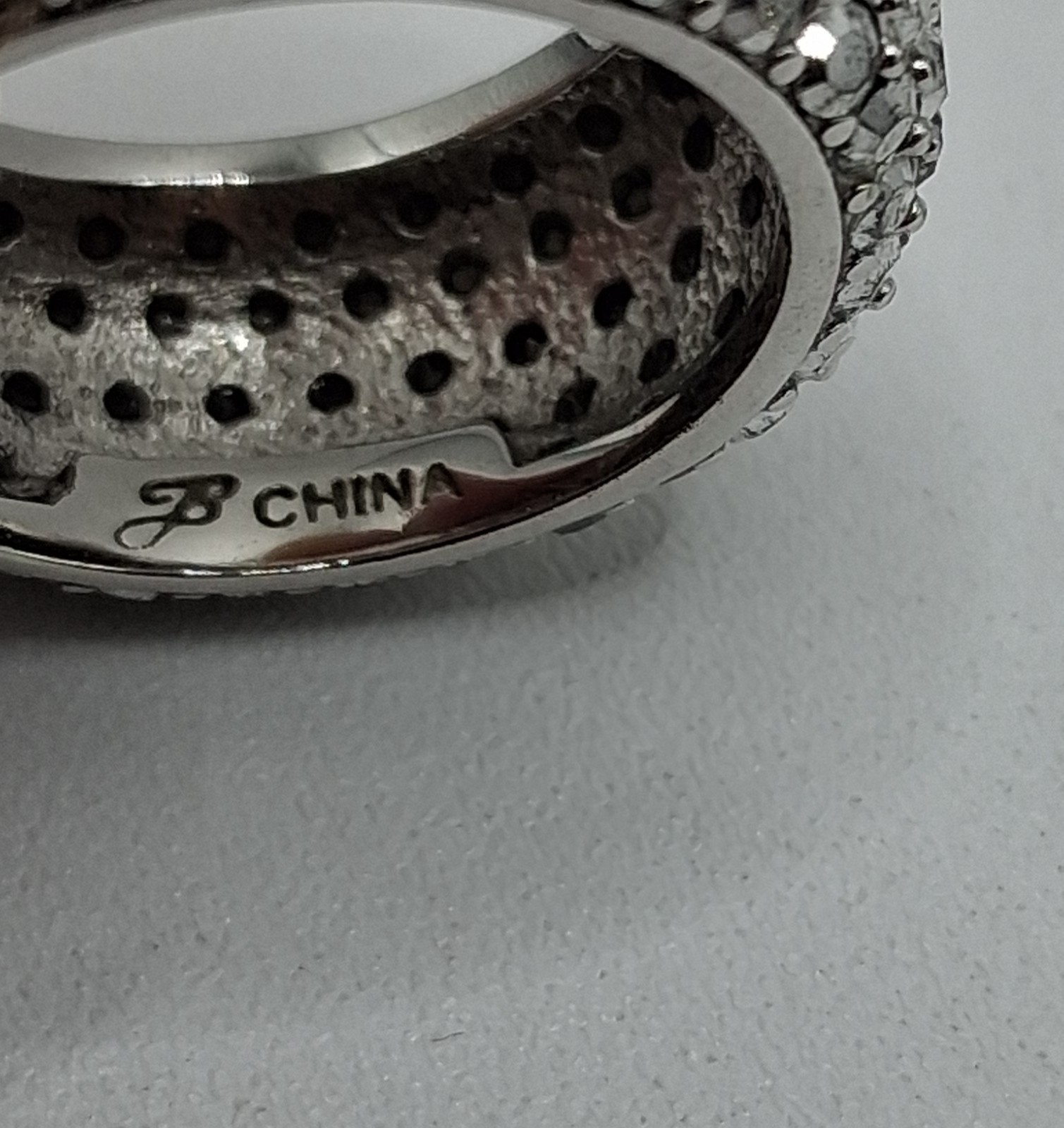 Joan Boyce Silver Tone Ring Metallic Silver Rhinestones 10mm Wide Size 6.75