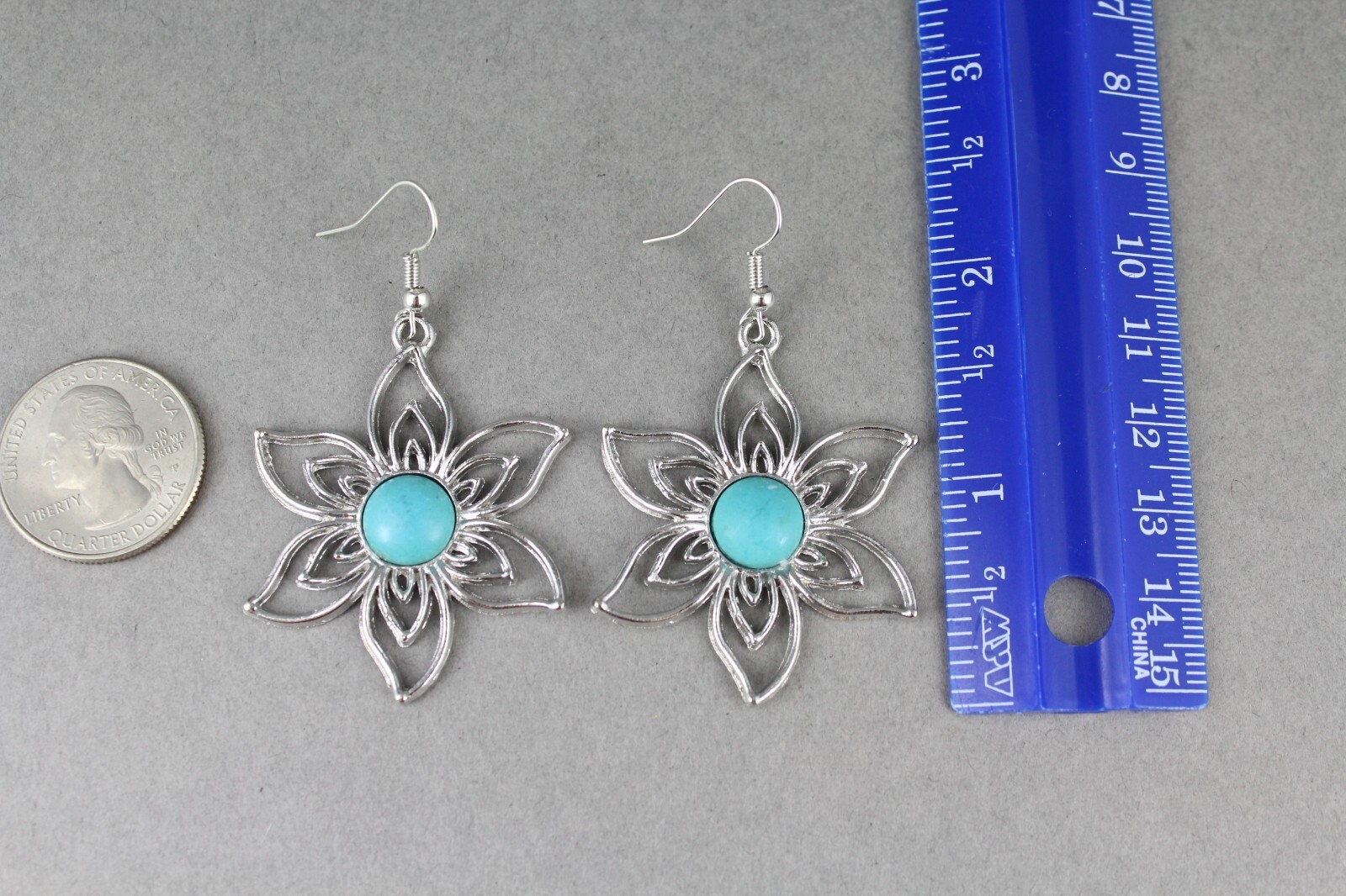 turquoise silver earrings lightweight flower outline dangle 2 3/8 long stamped