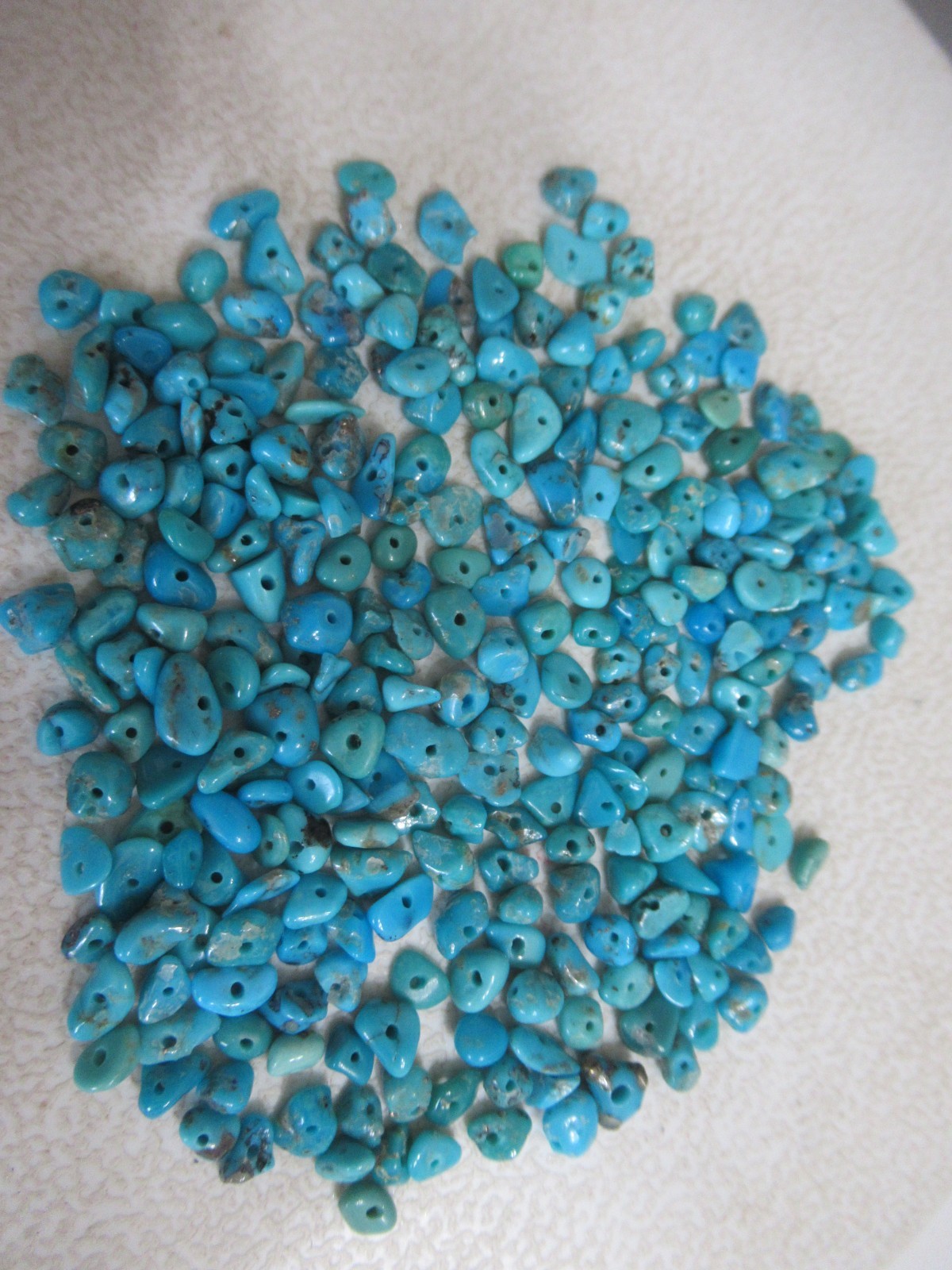 SLEEPING BEAUTY TURQUOISE 1/2 OZ SMALL DRILLED NUGGETS 3X2mm TO 6X4mm #765