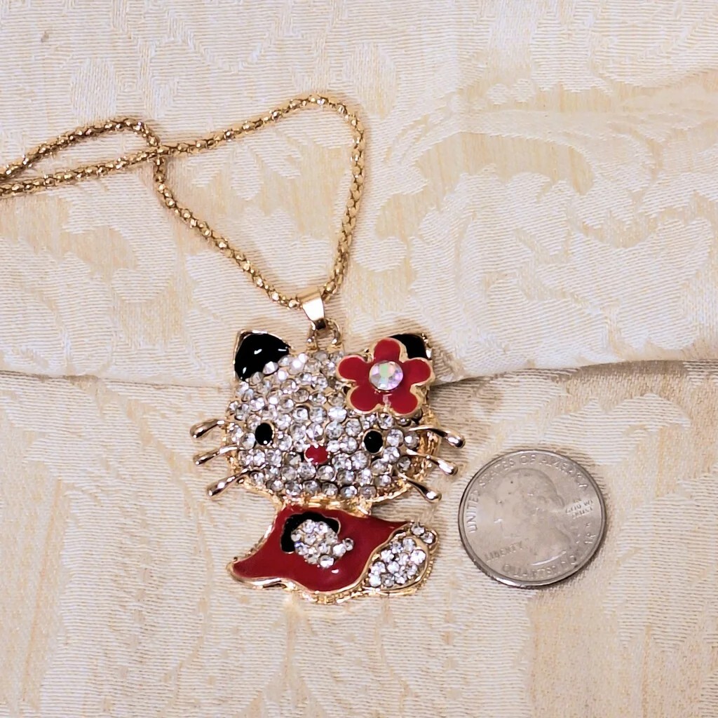 “Hello Kitty” cat pendant necklace Red & black enamel, silver rhinestones