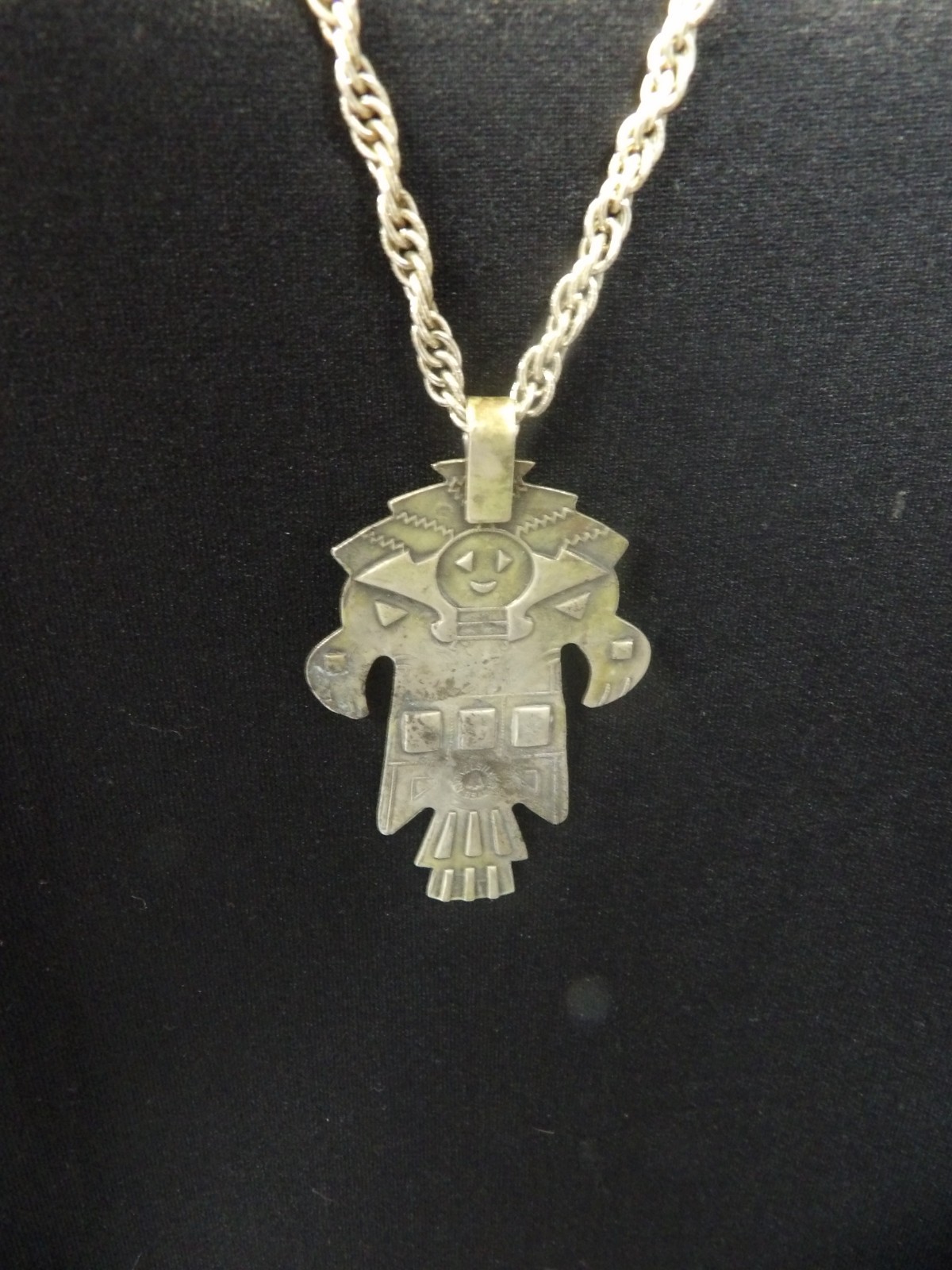 Navajo Kachina Totem Turquoise BRanded Nickle Silver Bell w/28″ Braided Chain.