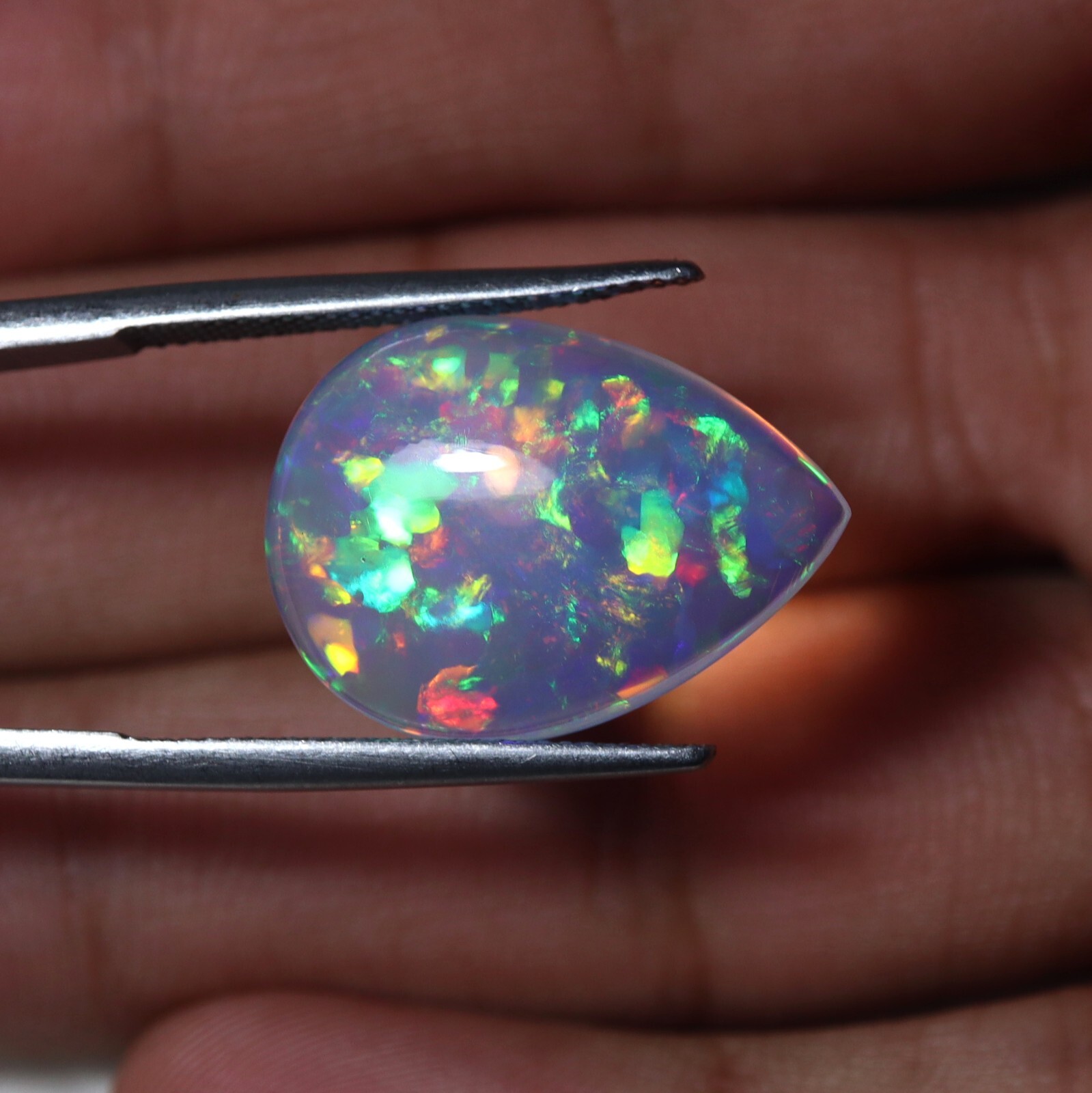 9 Carat 21.9×15.9 MM Natural AAAA Rainbow Fire Ethiopian Welo Opal Pear Shape