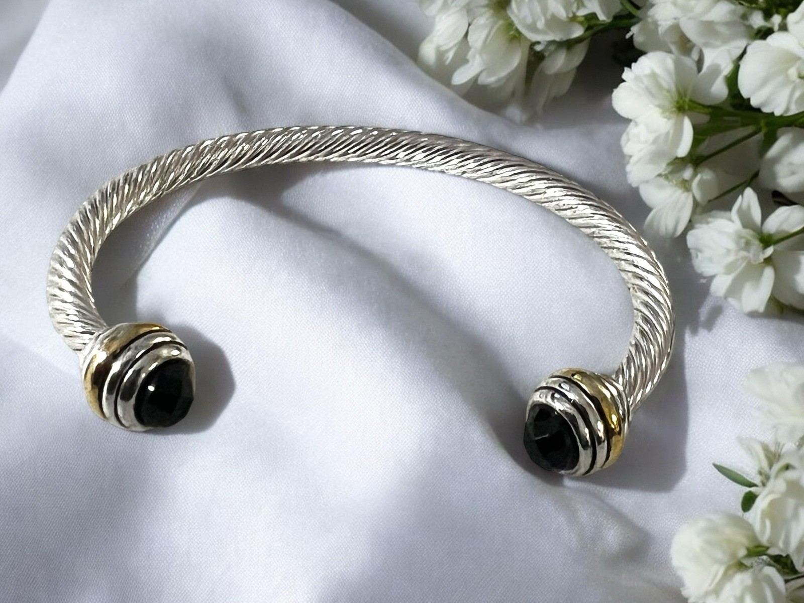 Silver Tone Twisted Open Cuff Bracelet with Black Faceted Stone Ends