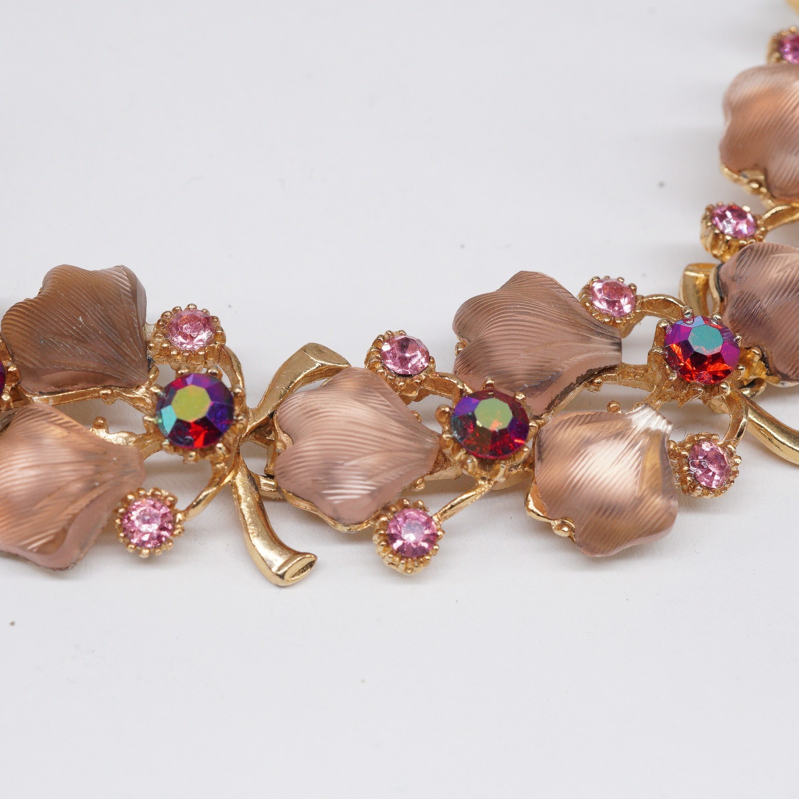 VTG bracelet Molded Glass Leaves AB Pink Rhinestones in Goldtone fold over clasp